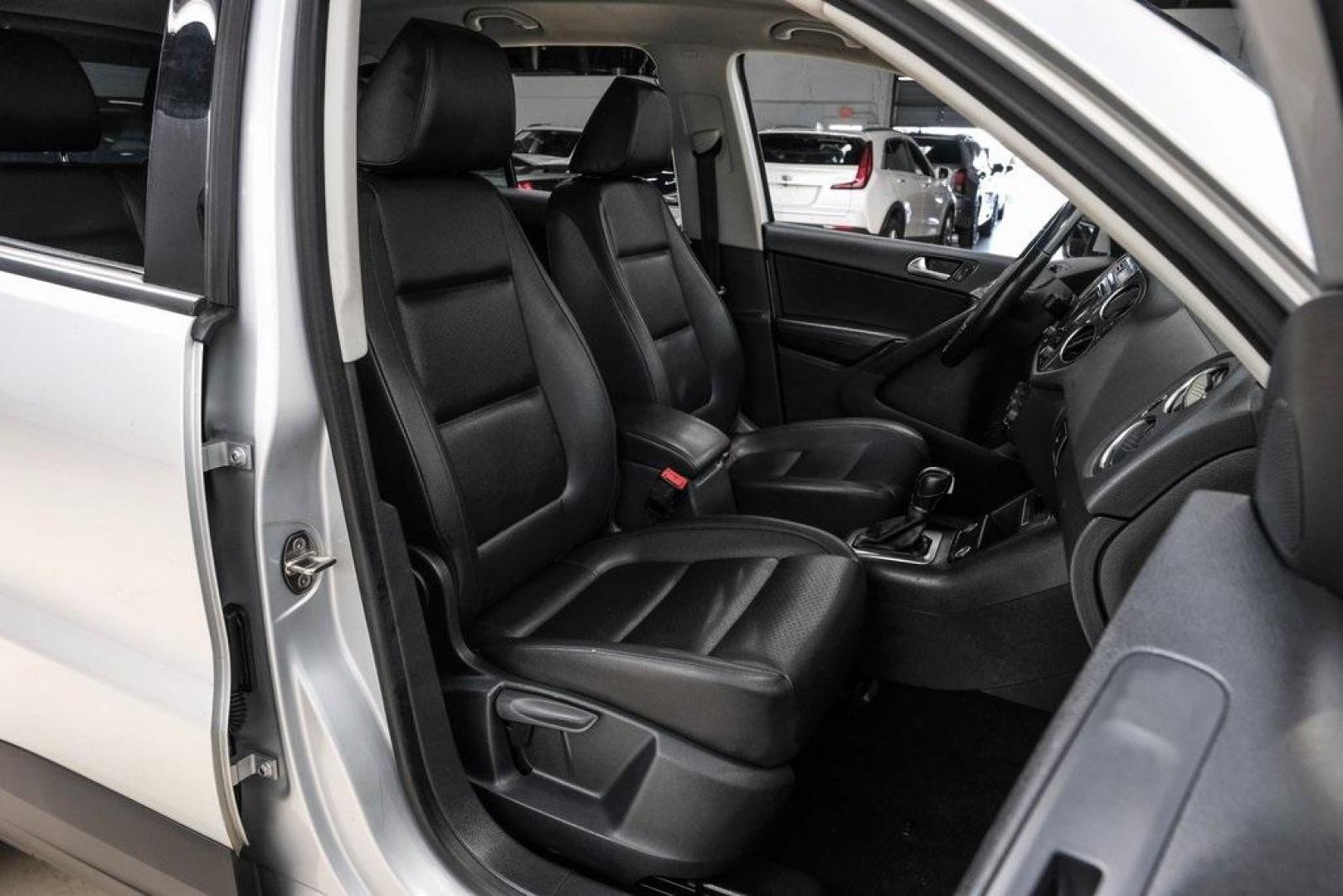 2016 Reflex Silver Metallic Volkswagen Tiguan S (WVGAV7AX0GW) with an 2.0L 4-Cylinder Turbocharged engine, Automatic transmission, located at 15300 Midway Rd., Addison, TX, 75001, (972) 702-0011, 32.958321, -96.838074 - Photo#41