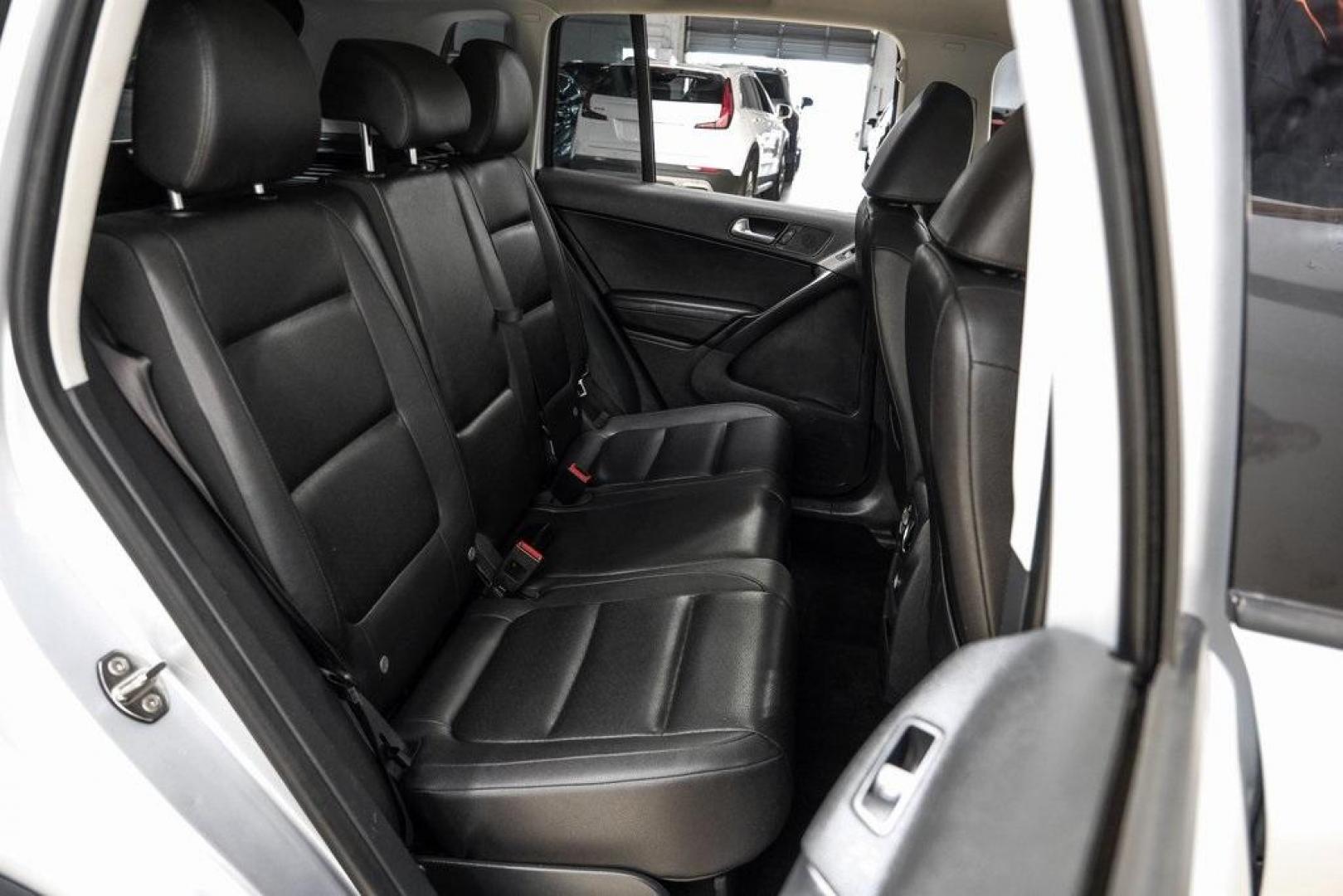 2016 Reflex Silver Metallic Volkswagen Tiguan S (WVGAV7AX0GW) with an 2.0L 4-Cylinder Turbocharged engine, Automatic transmission, located at 15300 Midway Rd., Addison, TX, 75001, (972) 702-0011, 32.958321, -96.838074 - Photo#43