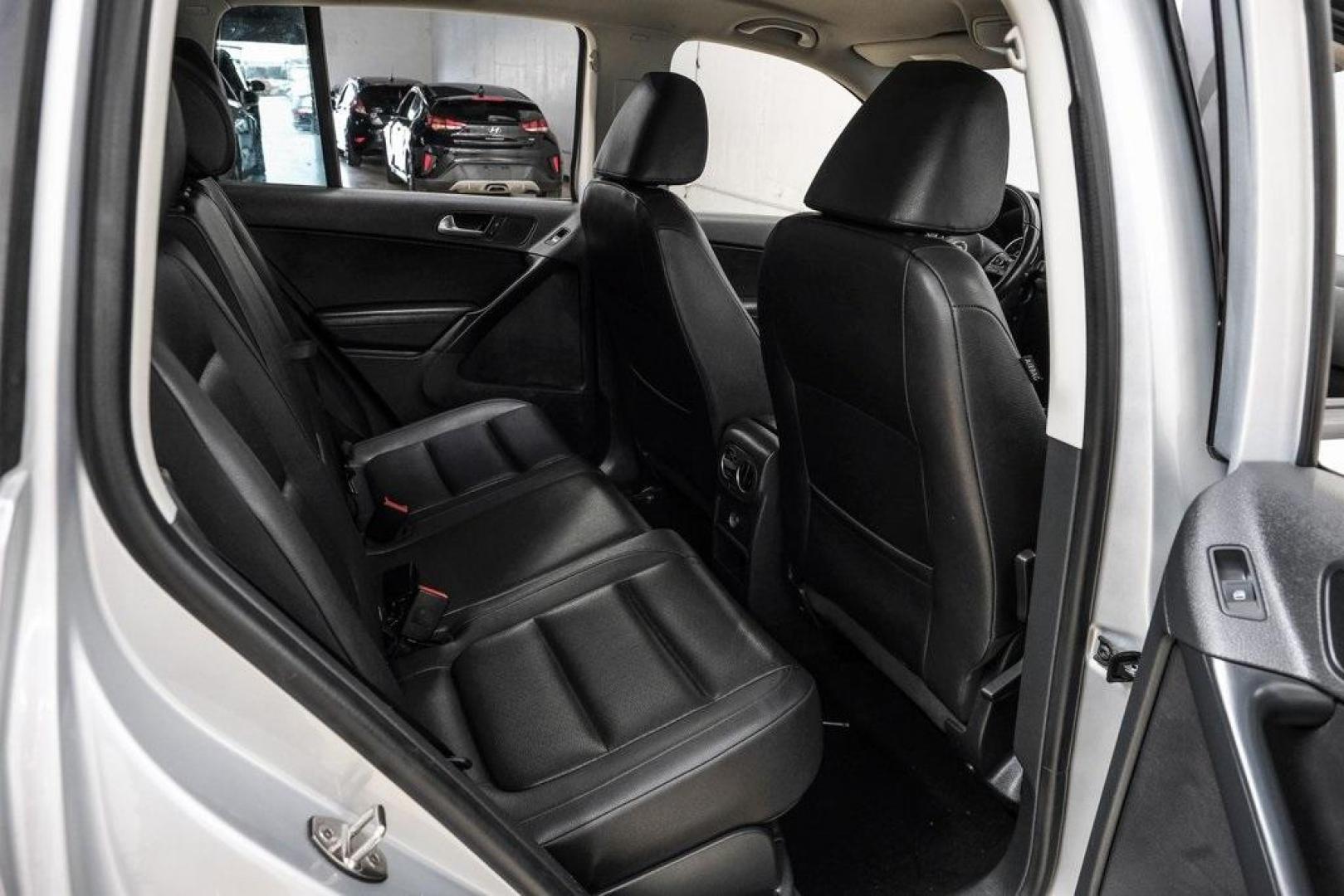 2016 Reflex Silver Metallic Volkswagen Tiguan S (WVGAV7AX0GW) with an 2.0L 4-Cylinder Turbocharged engine, Automatic transmission, located at 15300 Midway Rd., Addison, TX, 75001, (972) 702-0011, 32.958321, -96.838074 - Photo#44