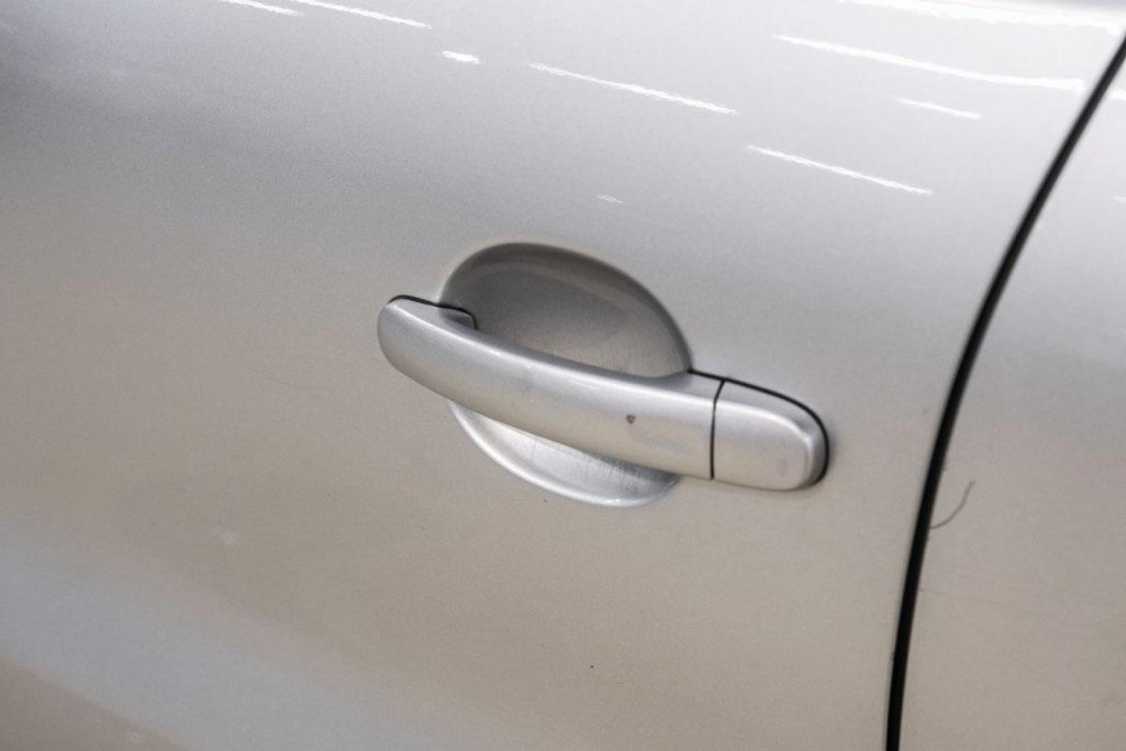 2016 Reflex Silver Metallic Volkswagen Tiguan S (WVGAV7AX0GW) with an 2.0L 4-Cylinder Turbocharged engine, Automatic transmission, located at 15300 Midway Rd., Addison, TX, 75001, (972) 702-0011, 32.958321, -96.838074 - Photo#48