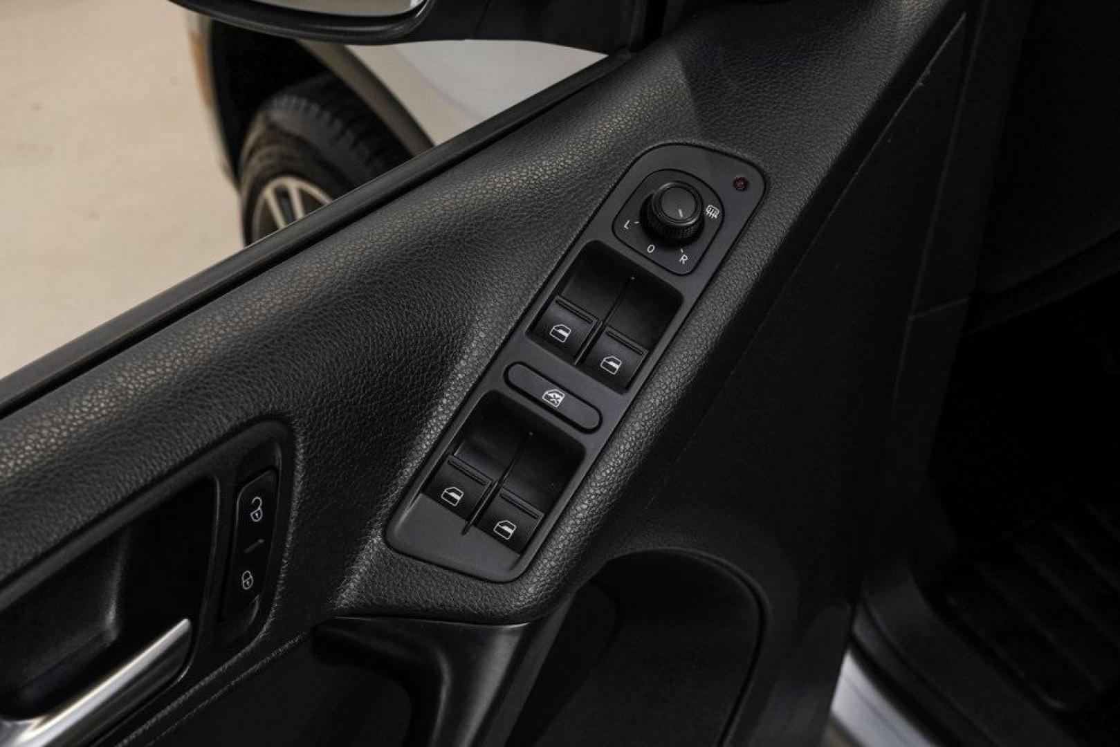 2016 Reflex Silver Metallic Volkswagen Tiguan S (WVGAV7AX0GW) with an 2.0L 4-Cylinder Turbocharged engine, Automatic transmission, located at 15300 Midway Rd., Addison, TX, 75001, (972) 702-0011, 32.958321, -96.838074 - Photo#51