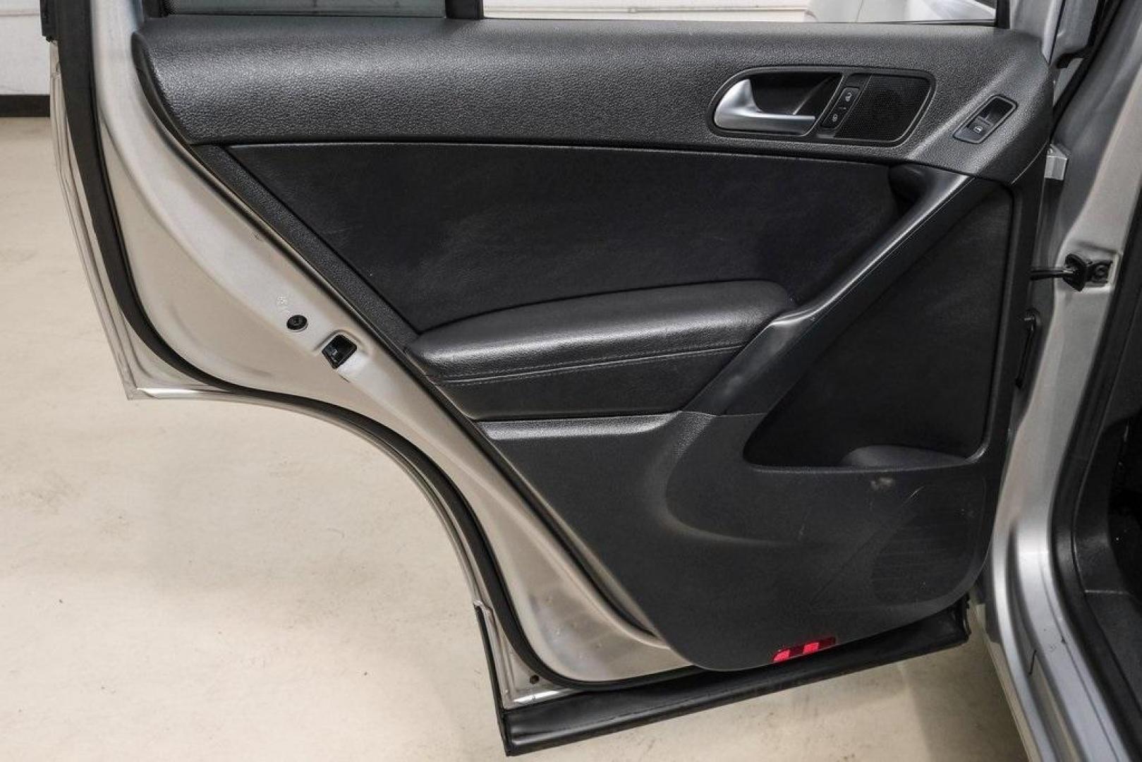 2016 Reflex Silver Metallic Volkswagen Tiguan S (WVGAV7AX0GW) with an 2.0L 4-Cylinder Turbocharged engine, Automatic transmission, located at 15300 Midway Rd., Addison, TX, 75001, (972) 702-0011, 32.958321, -96.838074 - Photo#53