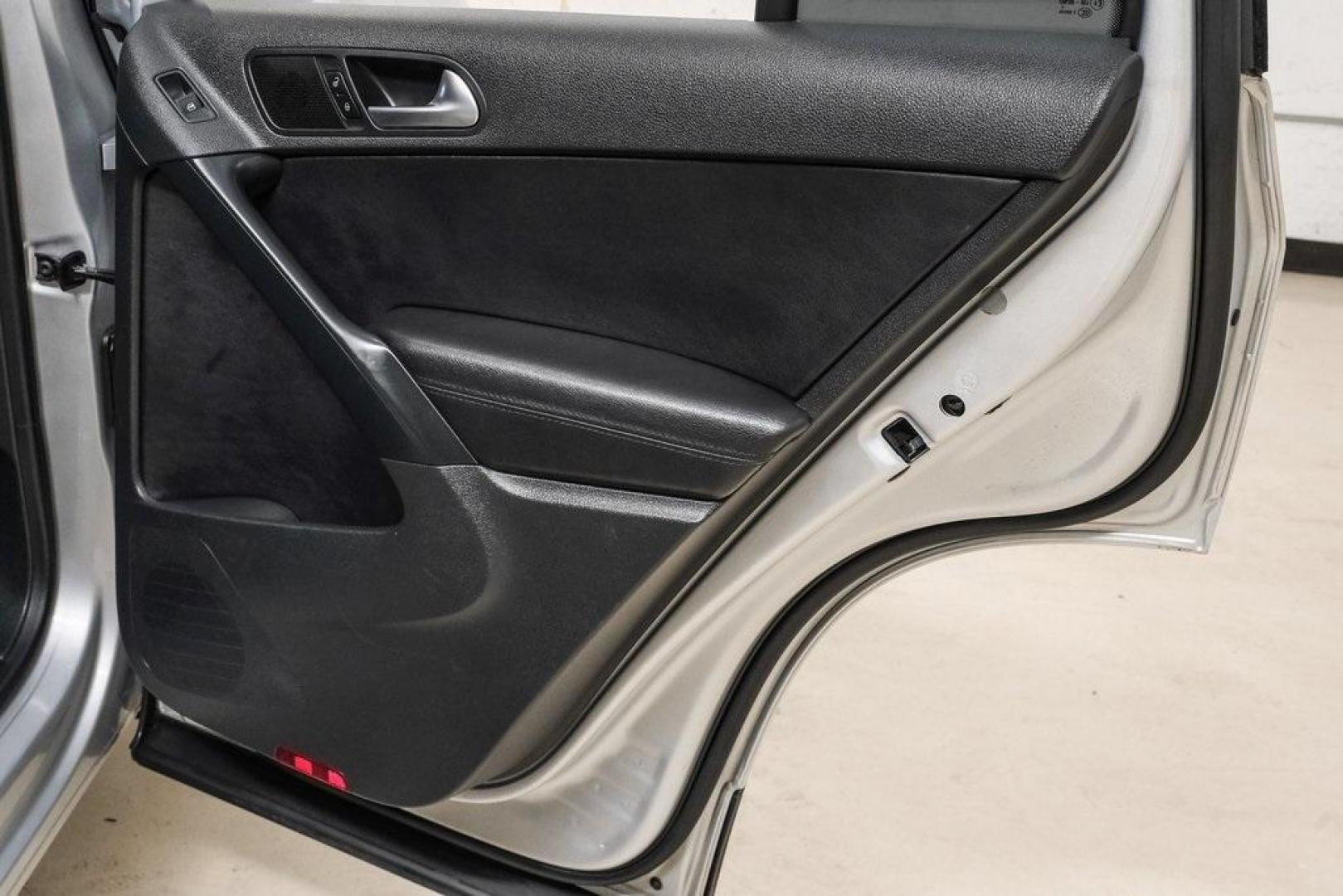 2016 Reflex Silver Metallic Volkswagen Tiguan S (WVGAV7AX0GW) with an 2.0L 4-Cylinder Turbocharged engine, Automatic transmission, located at 15300 Midway Rd., Addison, TX, 75001, (972) 702-0011, 32.958321, -96.838074 - Photo#54