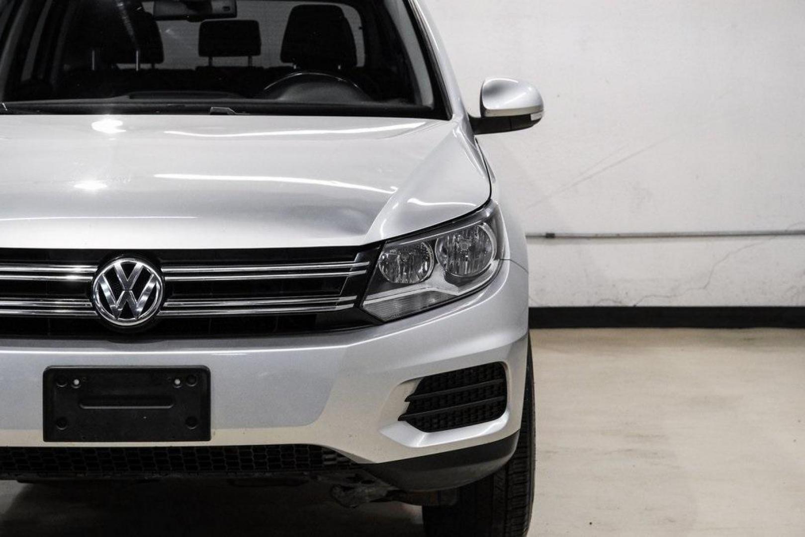 2016 Reflex Silver Metallic Volkswagen Tiguan S (WVGAV7AX0GW) with an 2.0L 4-Cylinder Turbocharged engine, Automatic transmission, located at 15300 Midway Rd., Addison, TX, 75001, (972) 702-0011, 32.958321, -96.838074 - Photo#55