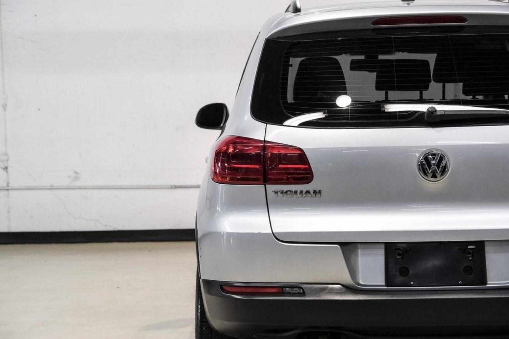 2016 Reflex Silver Metallic Volkswagen Tiguan S (WVGAV7AX0GW) with an 2.0L 4-Cylinder Turbocharged engine, Automatic transmission, located at 15300 Midway Rd., Addison, TX, 75001, (972) 702-0011, 32.958321, -96.838074 - Photo#56