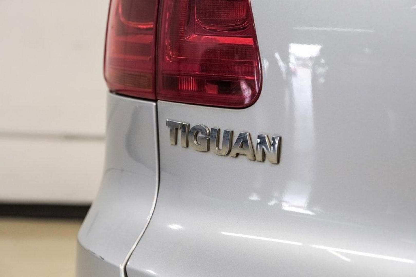 2016 Reflex Silver Metallic Volkswagen Tiguan S (WVGAV7AX0GW) with an 2.0L 4-Cylinder Turbocharged engine, Automatic transmission, located at 15300 Midway Rd., Addison, TX, 75001, (972) 702-0011, 32.958321, -96.838074 - Photo#57