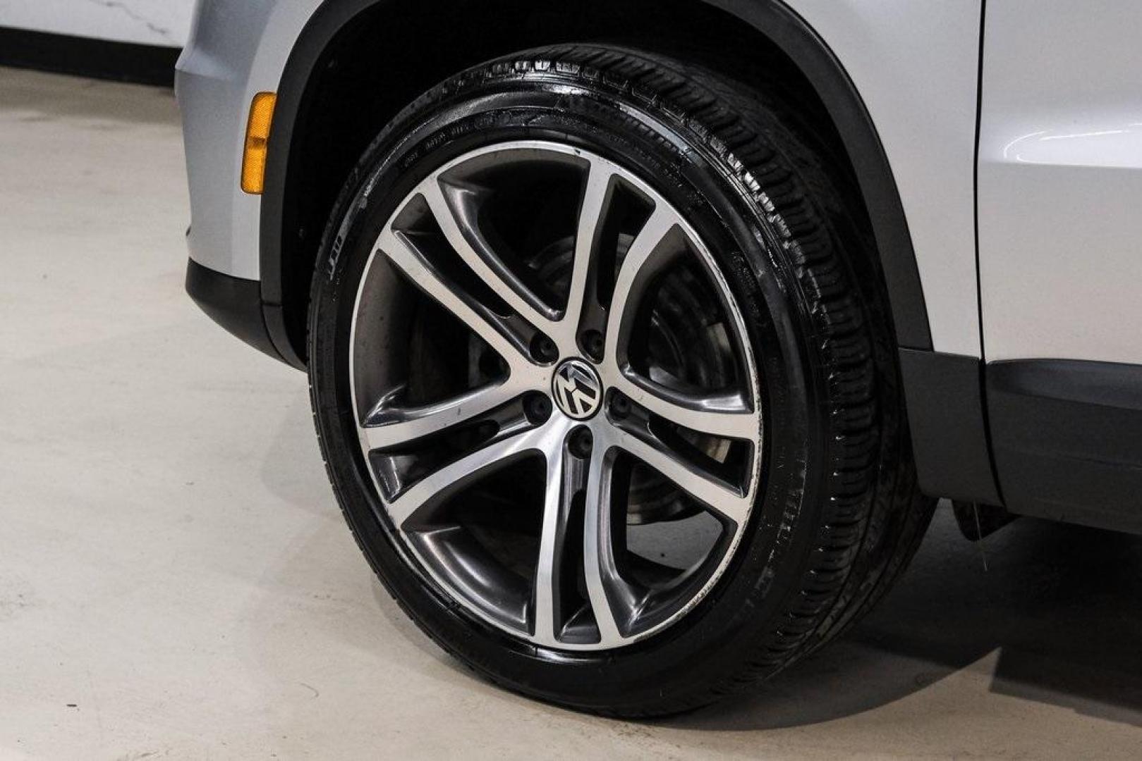 2016 Reflex Silver Metallic Volkswagen Tiguan S (WVGAV7AX0GW) with an 2.0L 4-Cylinder Turbocharged engine, Automatic transmission, located at 15300 Midway Rd., Addison, TX, 75001, (972) 702-0011, 32.958321, -96.838074 - Photo#64