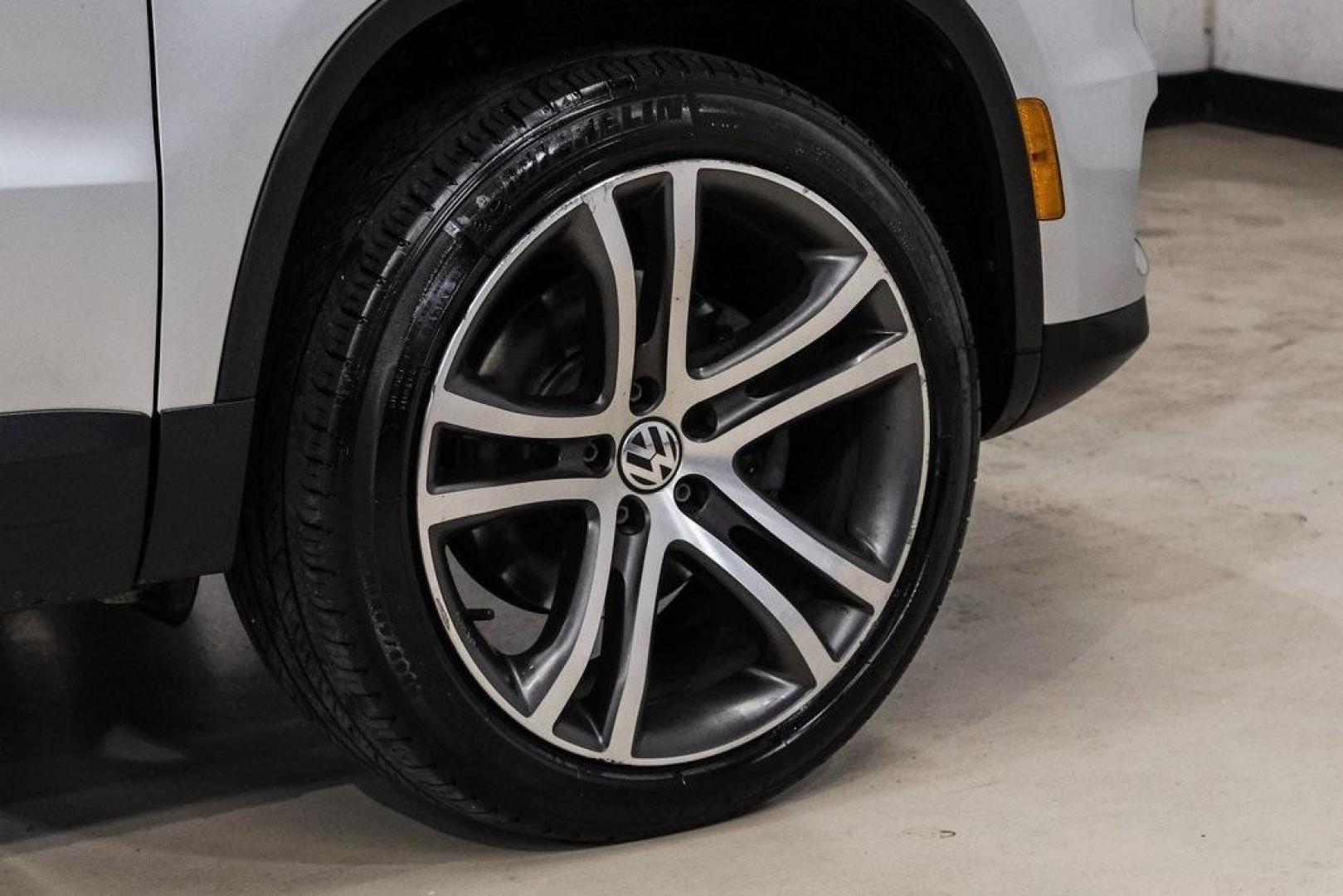 2016 Reflex Silver Metallic Volkswagen Tiguan S (WVGAV7AX0GW) with an 2.0L 4-Cylinder Turbocharged engine, Automatic transmission, located at 15300 Midway Rd., Addison, TX, 75001, (972) 702-0011, 32.958321, -96.838074 - Photo#67