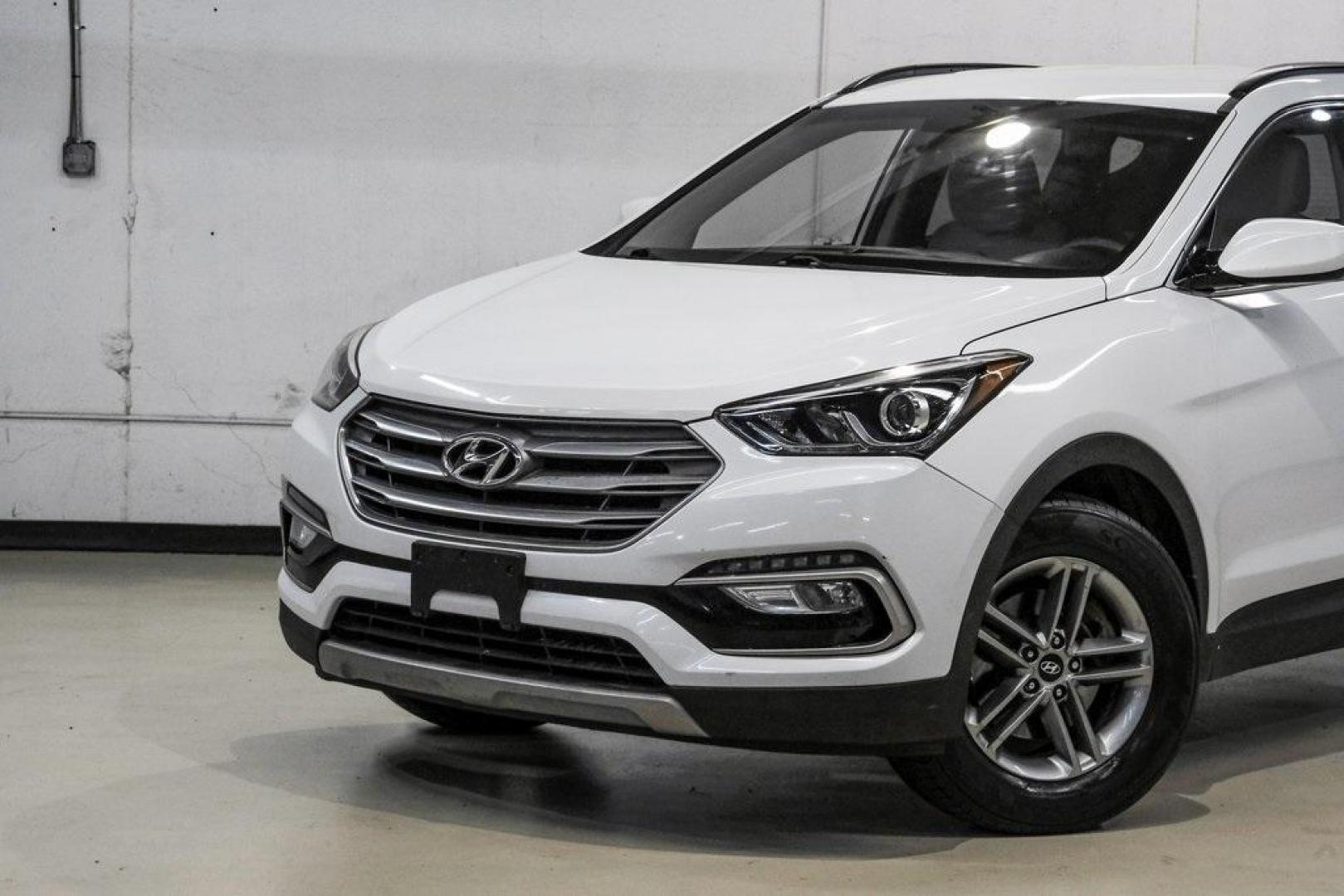 2017 Frost White Pearl /Beige Hyundai Santa Fe Sport 2.4 Base (5NMZUDLB6HH) with an 2.4L I4 DGI DOHC 16V engine, Automatic transmission, located at 15300 Midway Rd., Addison, TX, 75001, (972) 702-0011, 32.958321, -96.838074 - Photo#4