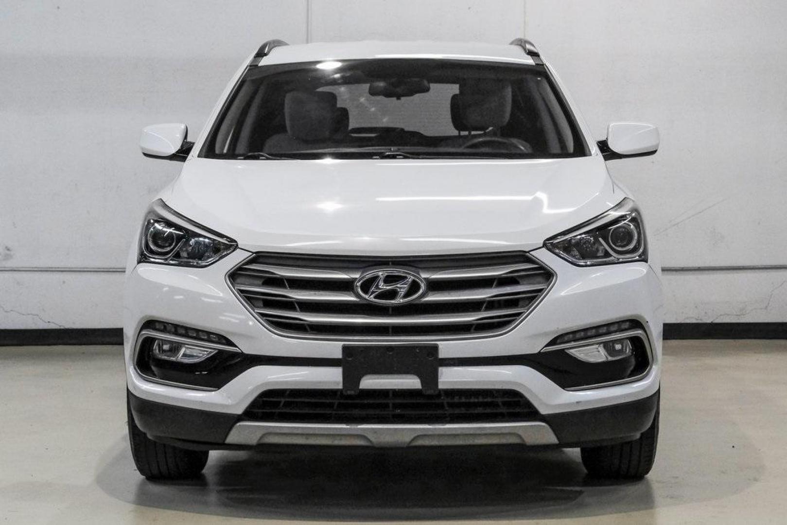 2017 Frost White Pearl /Beige Hyundai Santa Fe Sport 2.4 Base (5NMZUDLB6HH) with an 2.4L I4 DGI DOHC 16V engine, Automatic transmission, located at 15300 Midway Rd., Addison, TX, 75001, (972) 702-0011, 32.958321, -96.838074 - Photo#6
