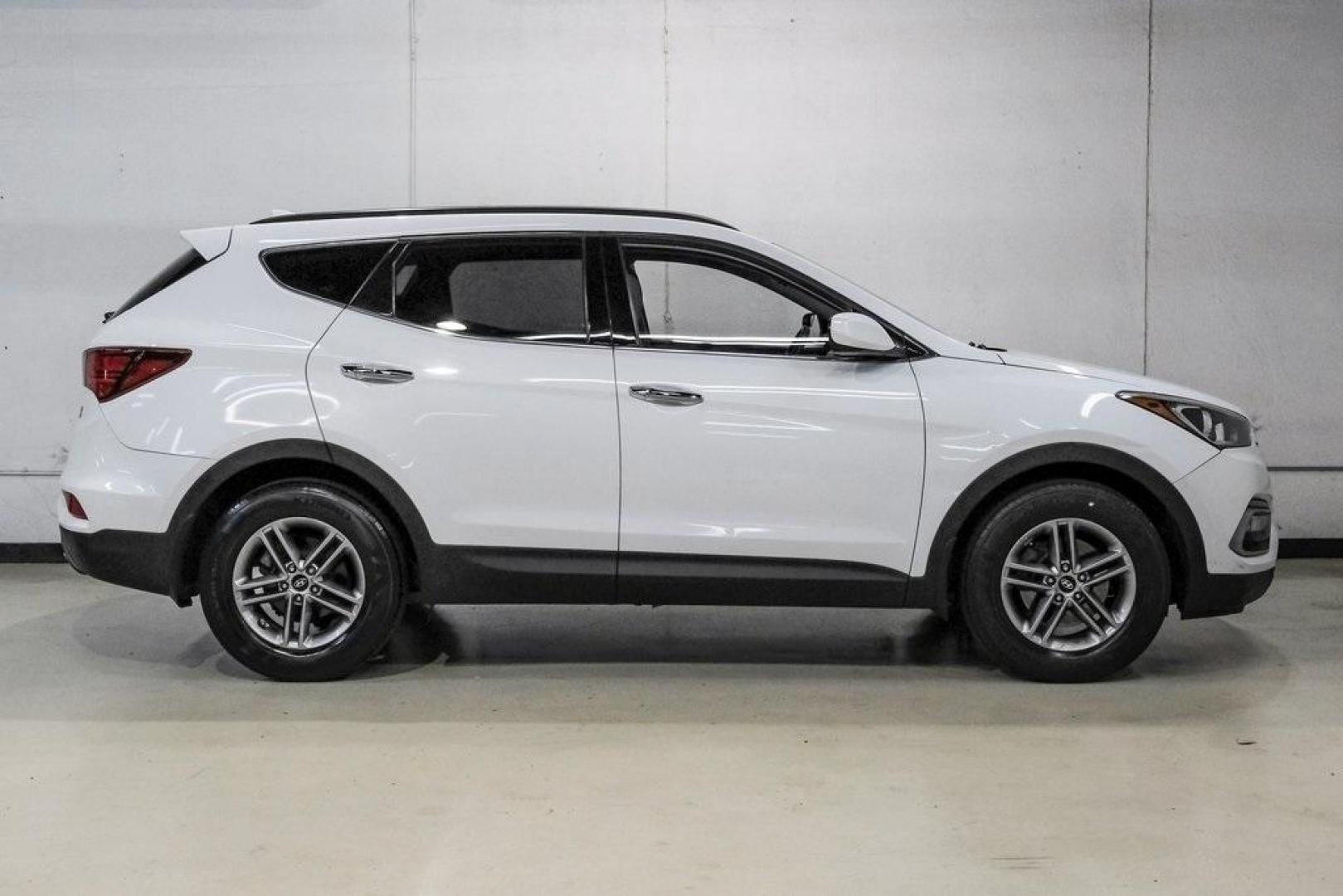 2017 Frost White Pearl /Beige Hyundai Santa Fe Sport 2.4 Base (5NMZUDLB6HH) with an 2.4L I4 DGI DOHC 16V engine, Automatic transmission, located at 15300 Midway Rd., Addison, TX, 75001, (972) 702-0011, 32.958321, -96.838074 - Photo#8