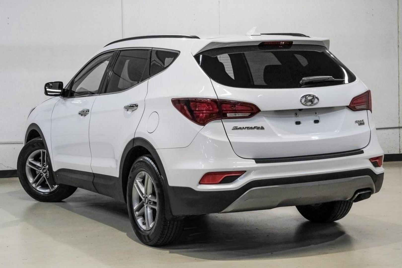 2017 Frost White Pearl /Beige Hyundai Santa Fe Sport 2.4 Base (5NMZUDLB6HH) with an 2.4L I4 DGI DOHC 16V engine, Automatic transmission, located at 15300 Midway Rd., Addison, TX, 75001, (972) 702-0011, 32.958321, -96.838074 - Photo#11