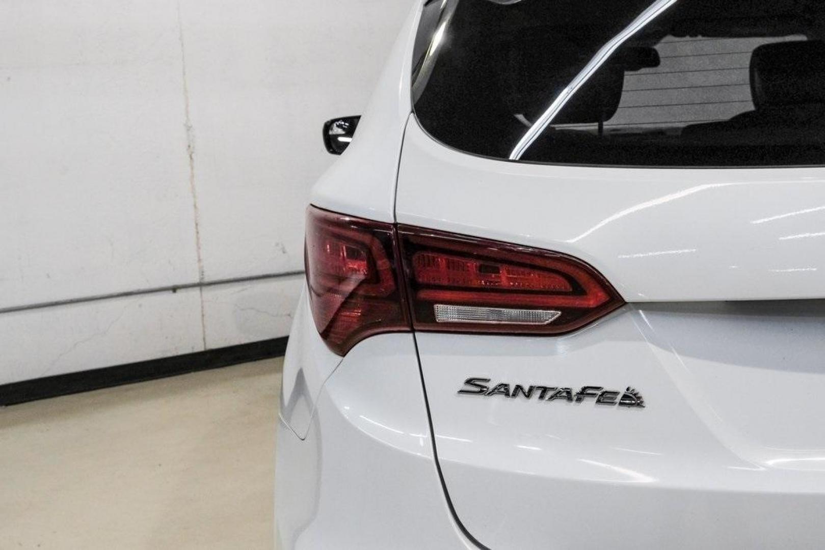 2017 Frost White Pearl /Beige Hyundai Santa Fe Sport 2.4 Base (5NMZUDLB6HH) with an 2.4L I4 DGI DOHC 16V engine, Automatic transmission, located at 15300 Midway Rd., Addison, TX, 75001, (972) 702-0011, 32.958321, -96.838074 - Photo#49