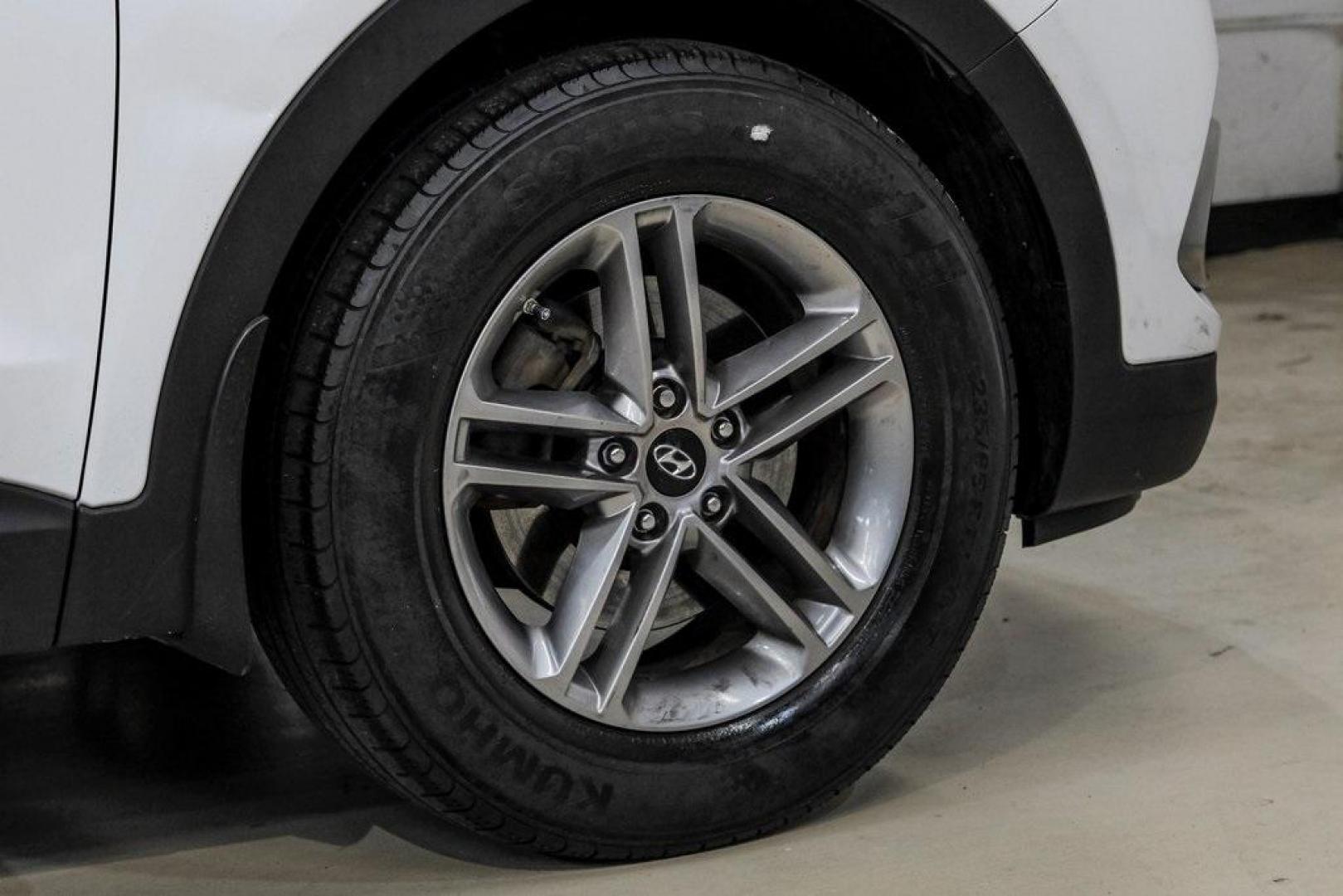 2017 Frost White Pearl /Beige Hyundai Santa Fe Sport 2.4 Base (5NMZUDLB6HH) with an 2.4L I4 DGI DOHC 16V engine, Automatic transmission, located at 15300 Midway Rd., Addison, TX, 75001, (972) 702-0011, 32.958321, -96.838074 - Photo#60