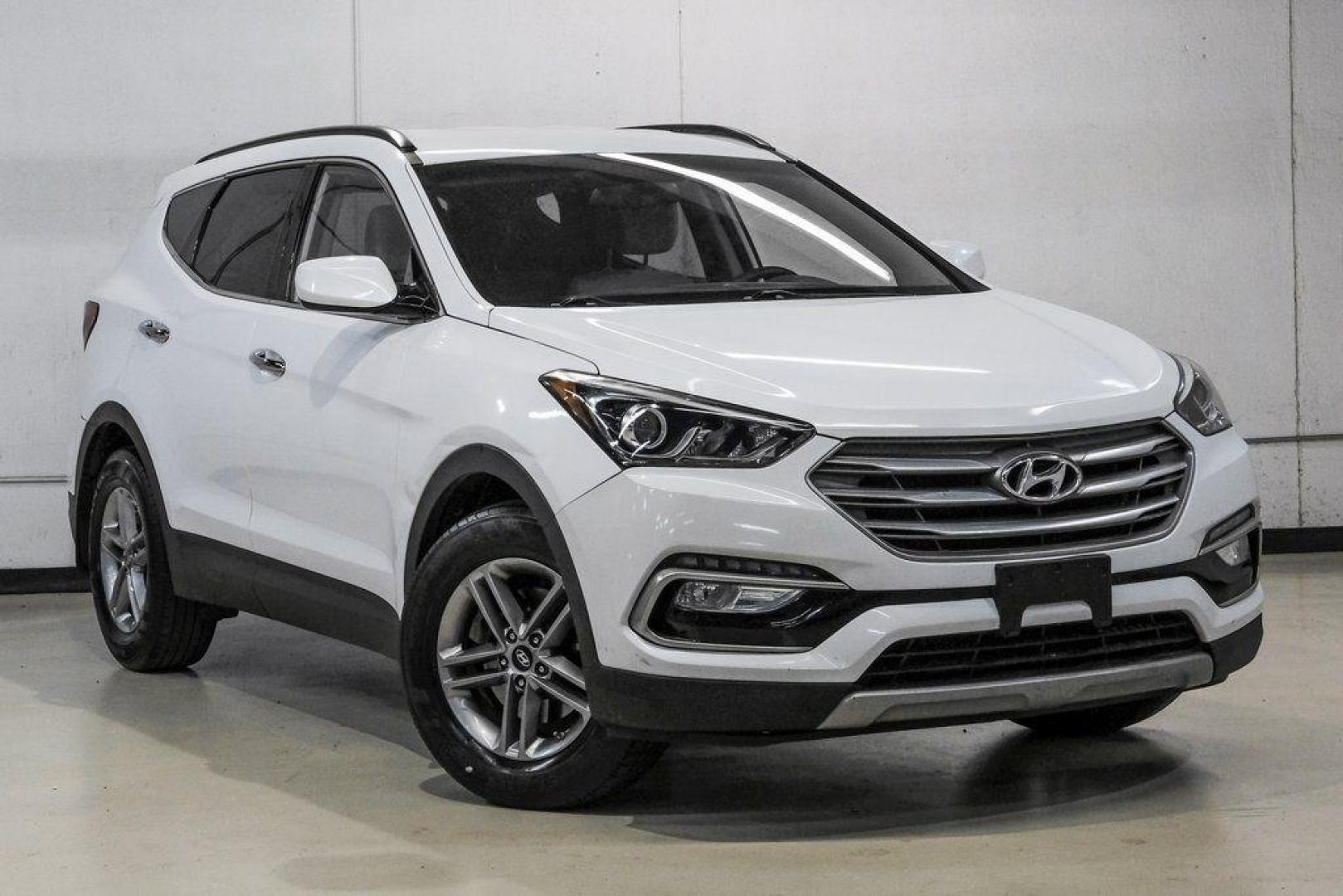 2017 Frost White Pearl /Beige Hyundai Santa Fe Sport 2.4 Base (5NMZUDLB6HH) with an 2.4L I4 DGI DOHC 16V engine, Automatic transmission, located at 15300 Midway Rd., Addison, TX, 75001, (972) 702-0011, 32.958321, -96.838074 - Photo#7