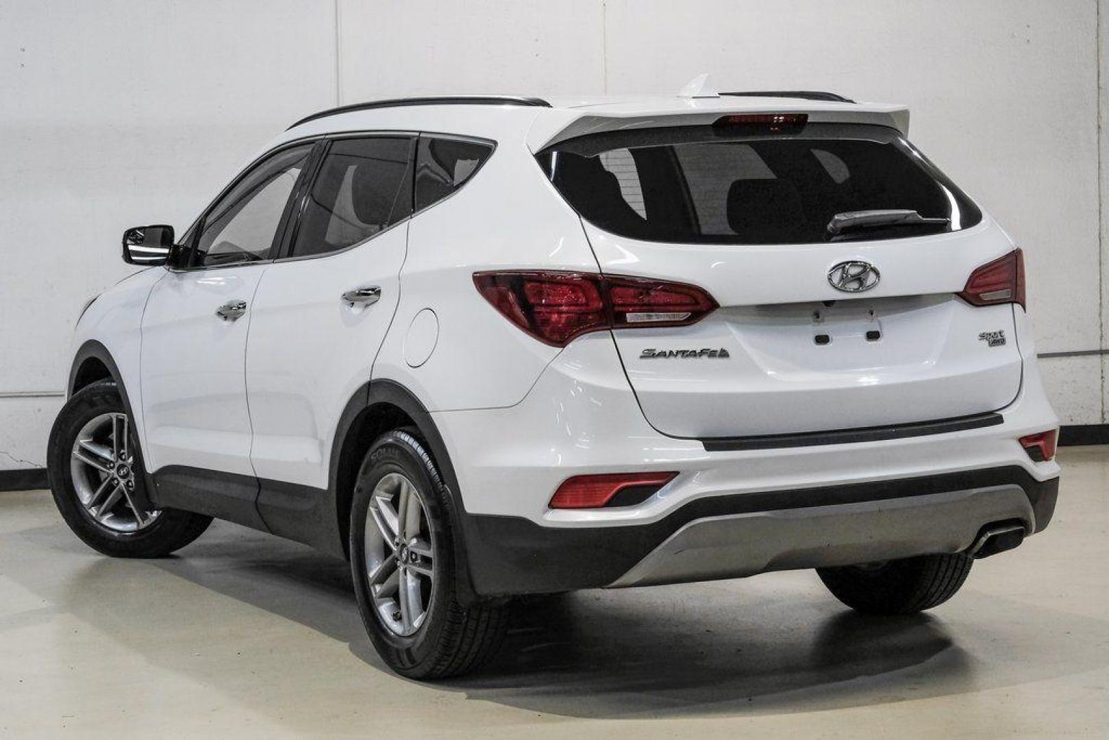 2017 Frost White Pearl /Beige Hyundai Santa Fe Sport 2.4 Base (5NMZUDLB6HH) with an 2.4L I4 DGI DOHC 16V engine, Automatic transmission, located at 15300 Midway Rd., Addison, TX, 75001, (972) 702-0011, 32.958321, -96.838074 - Photo#11