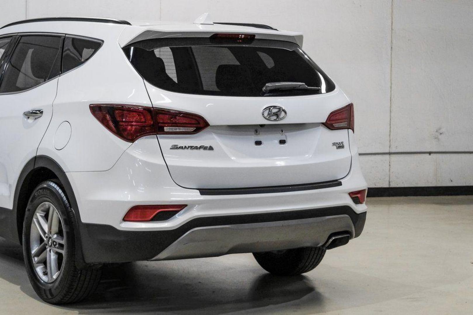 2017 Frost White Pearl /Beige Hyundai Santa Fe Sport 2.4 Base (5NMZUDLB6HH) with an 2.4L I4 DGI DOHC 16V engine, Automatic transmission, located at 15300 Midway Rd., Addison, TX, 75001, (972) 702-0011, 32.958321, -96.838074 - Photo#13