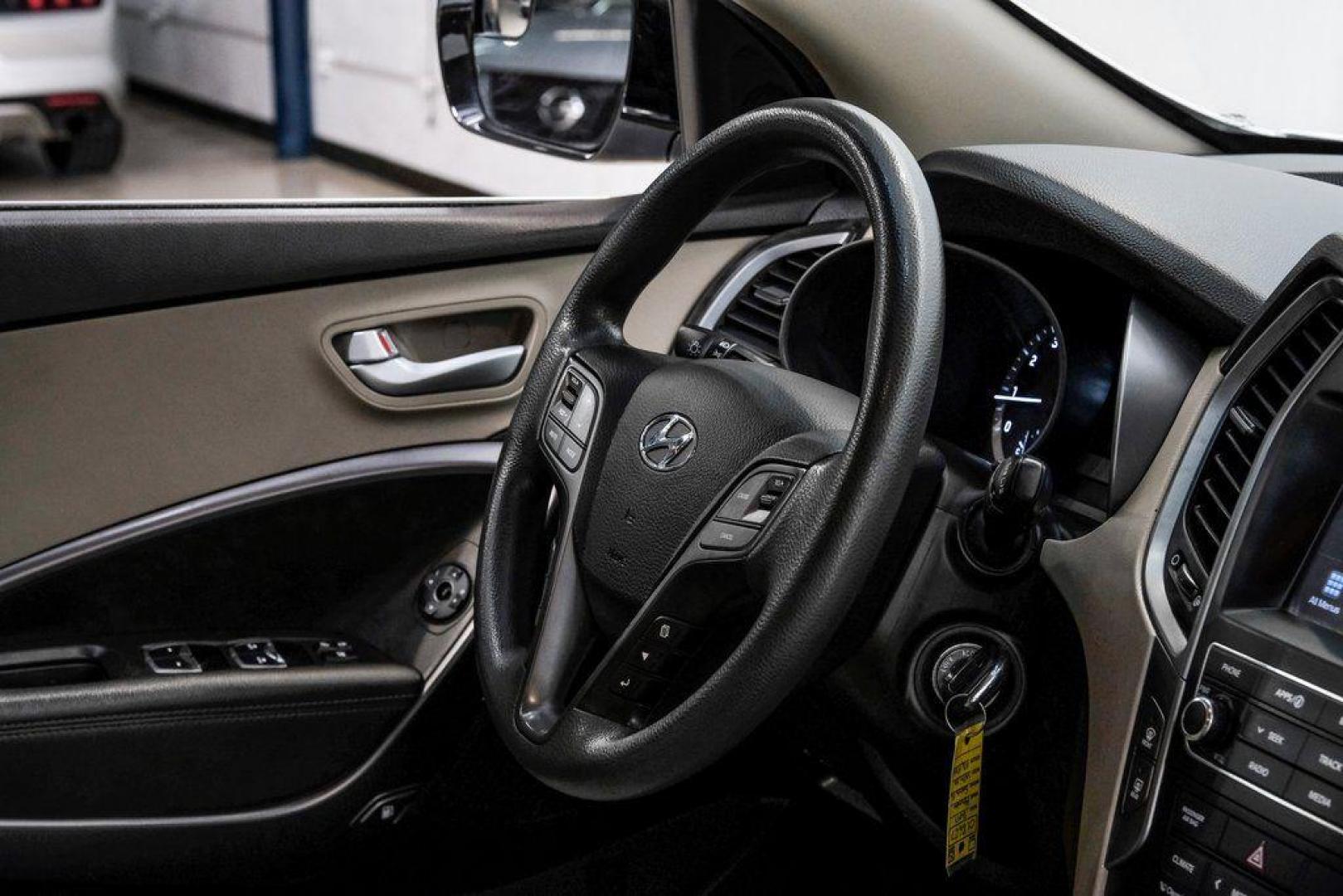 2017 Frost White Pearl /Beige Hyundai Santa Fe Sport 2.4 Base (5NMZUDLB6HH) with an 2.4L I4 DGI DOHC 16V engine, Automatic transmission, located at 15300 Midway Rd., Addison, TX, 75001, (972) 702-0011, 32.958321, -96.838074 - Photo#19