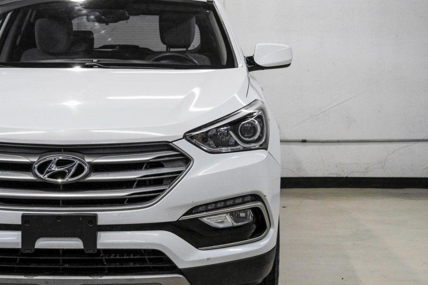 2017 Frost White Pearl /Beige Hyundai Santa Fe Sport 2.4 Base (5NMZUDLB6HH) with an 2.4L I4 DGI DOHC 16V engine, Automatic transmission, located at 15300 Midway Rd., Addison, TX, 75001, (972) 702-0011, 32.958321, -96.838074 - Photo#48