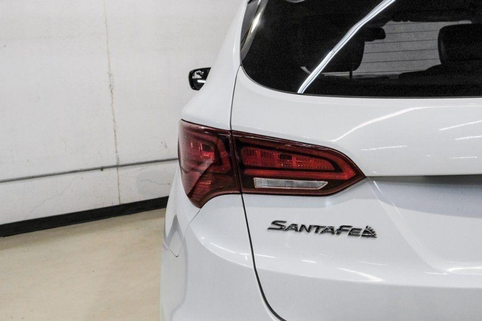 2017 Frost White Pearl /Beige Hyundai Santa Fe Sport 2.4 Base (5NMZUDLB6HH) with an 2.4L I4 DGI DOHC 16V engine, Automatic transmission, located at 15300 Midway Rd., Addison, TX, 75001, (972) 702-0011, 32.958321, -96.838074 - Photo#49