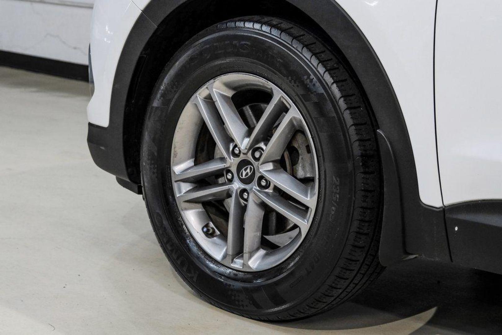 2017 Frost White Pearl /Beige Hyundai Santa Fe Sport 2.4 Base (5NMZUDLB6HH) with an 2.4L I4 DGI DOHC 16V engine, Automatic transmission, located at 15300 Midway Rd., Addison, TX, 75001, (972) 702-0011, 32.958321, -96.838074 - Photo#57