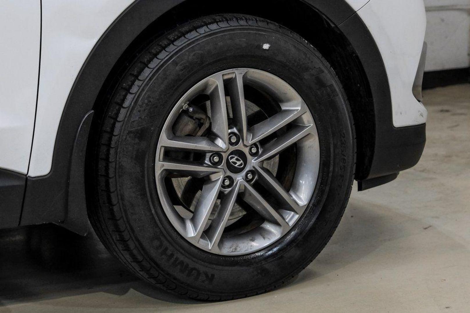 2017 Frost White Pearl /Beige Hyundai Santa Fe Sport 2.4 Base (5NMZUDLB6HH) with an 2.4L I4 DGI DOHC 16V engine, Automatic transmission, located at 15300 Midway Rd., Addison, TX, 75001, (972) 702-0011, 32.958321, -96.838074 - Photo#60