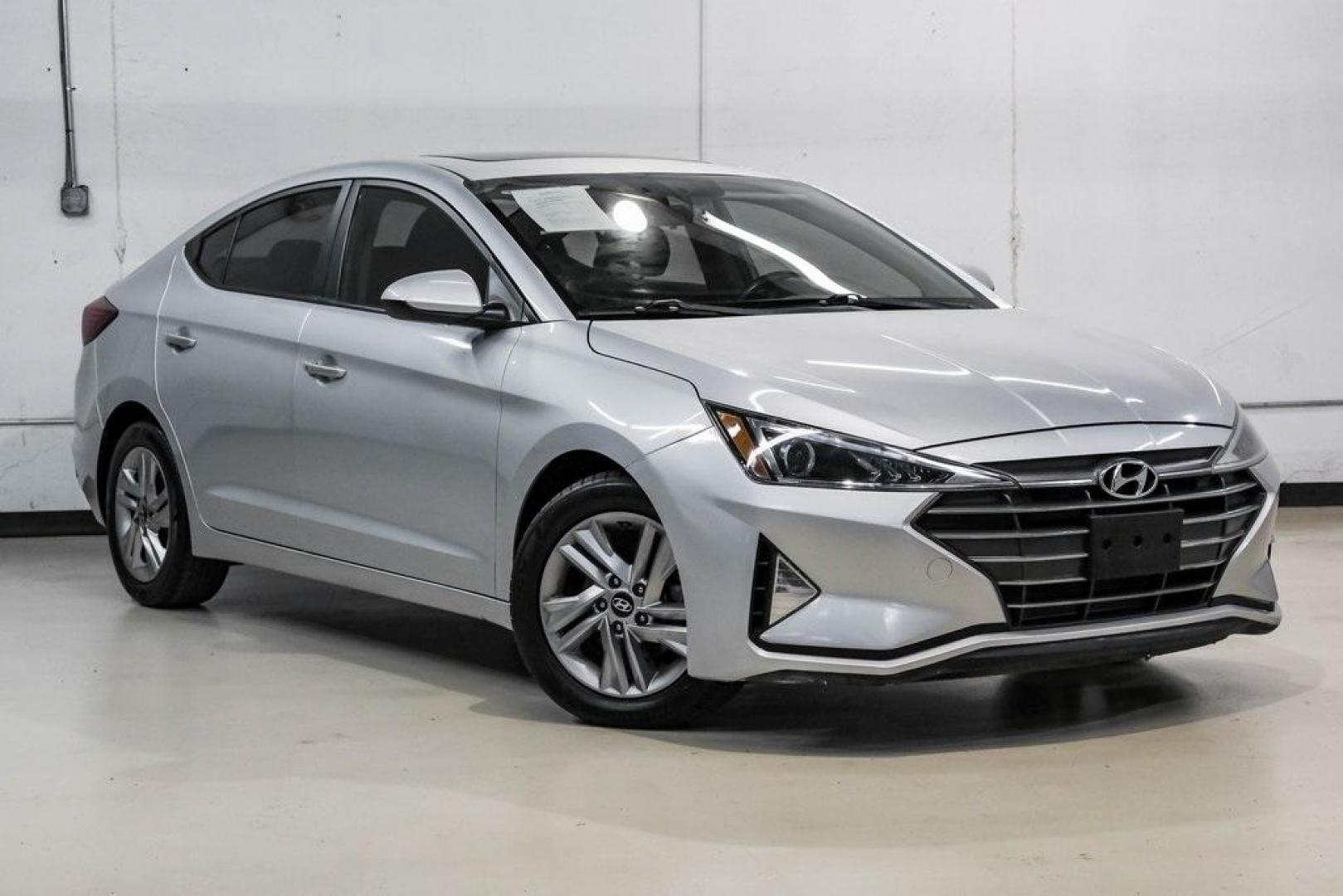 2019 Symphony Silver /Black Hyundai Elantra Value Edition (KMHD84LF0KU) with an 2.0L 4-Cylinder DOHC 16V engine, Automatic transmission, located at 15300 Midway Rd., Addison, TX, 75001, (972) 702-0011, 32.958321, -96.838074 - Photo#7