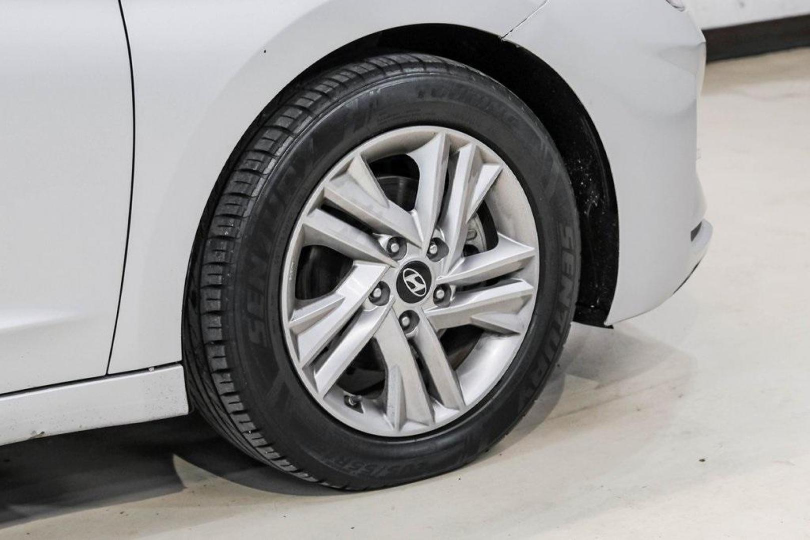 2019 Symphony Silver /Black Hyundai Elantra Value Edition (KMHD84LF0KU) with an 2.0L 4-Cylinder DOHC 16V engine, Automatic transmission, located at 15300 Midway Rd., Addison, TX, 75001, (972) 702-0011, 32.958321, -96.838074 - Photo#63