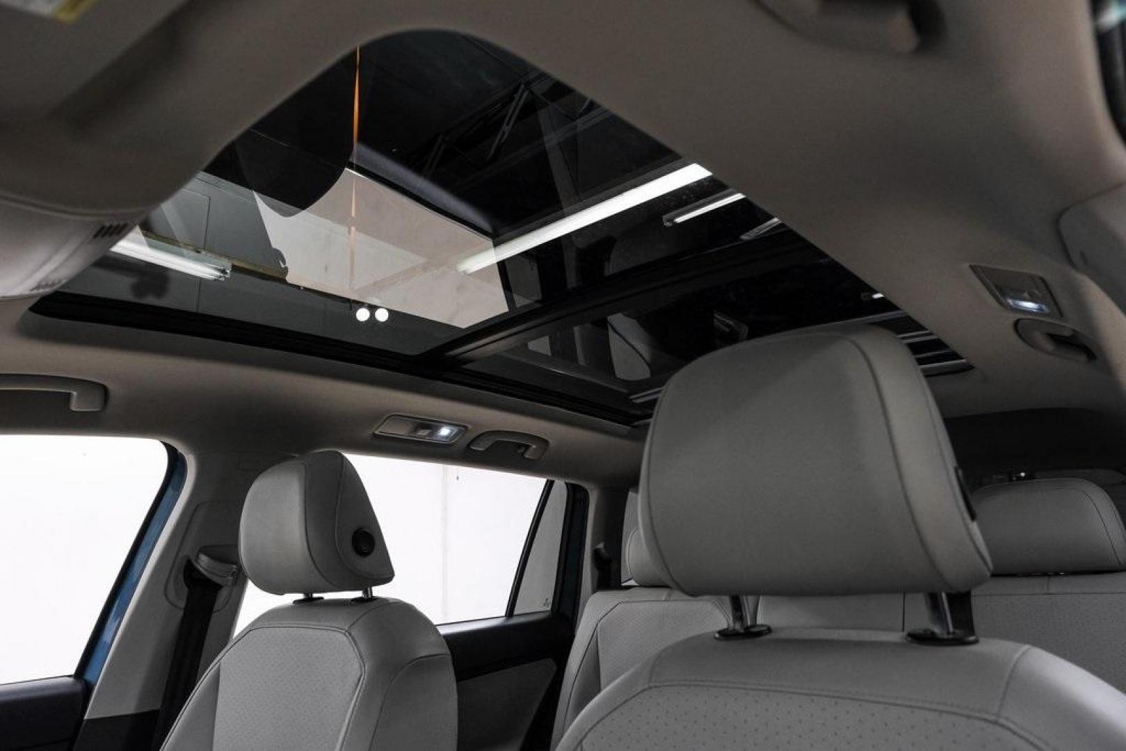 2019 Blue Metallic /Storm Gray Volkswagen Tiguan 2.0T SEL (3VV3B7AX8KM) with an 2.0L TSI DOHC engine, Automatic transmission, located at 15300 Midway Rd., Addison, TX, 75001, (972) 702-0011, 32.958321, -96.838074 - Photo#4