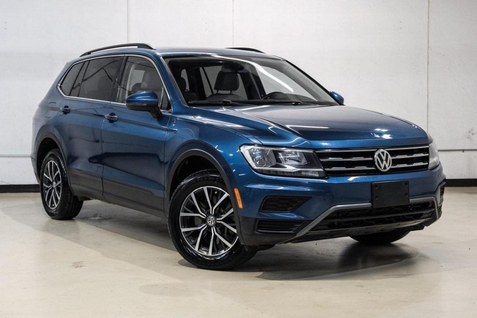 2019 Blue Metallic /Storm Gray Volkswagen Tiguan 2.0T SEL (3VV3B7AX8KM) with an 2.0L TSI DOHC engine, Automatic transmission, located at 15300 Midway Rd., Addison, TX, 75001, (972) 702-0011, 32.958321, -96.838074 - Photo#8