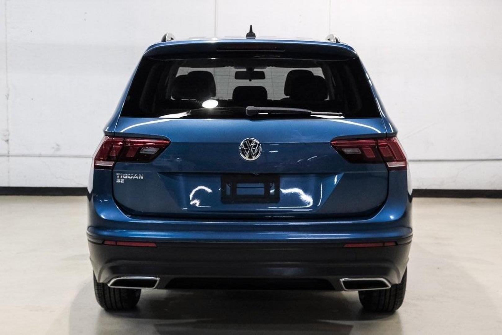 2019 Blue Metallic /Storm Gray Volkswagen Tiguan 2.0T SEL (3VV3B7AX8KM) with an 2.0L TSI DOHC engine, Automatic transmission, located at 15300 Midway Rd., Addison, TX, 75001, (972) 702-0011, 32.958321, -96.838074 - Photo#11