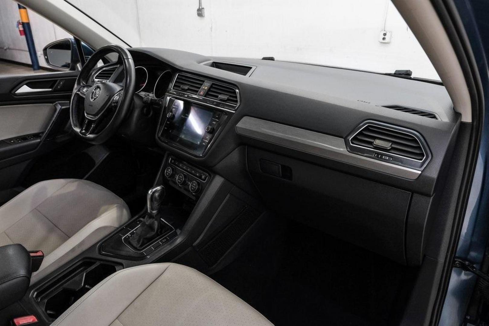 2019 Blue Metallic /Storm Gray Volkswagen Tiguan 2.0T SEL (3VV3B7AX8KM) with an 2.0L TSI DOHC engine, Automatic transmission, located at 15300 Midway Rd., Addison, TX, 75001, (972) 702-0011, 32.958321, -96.838074 - Photo#18