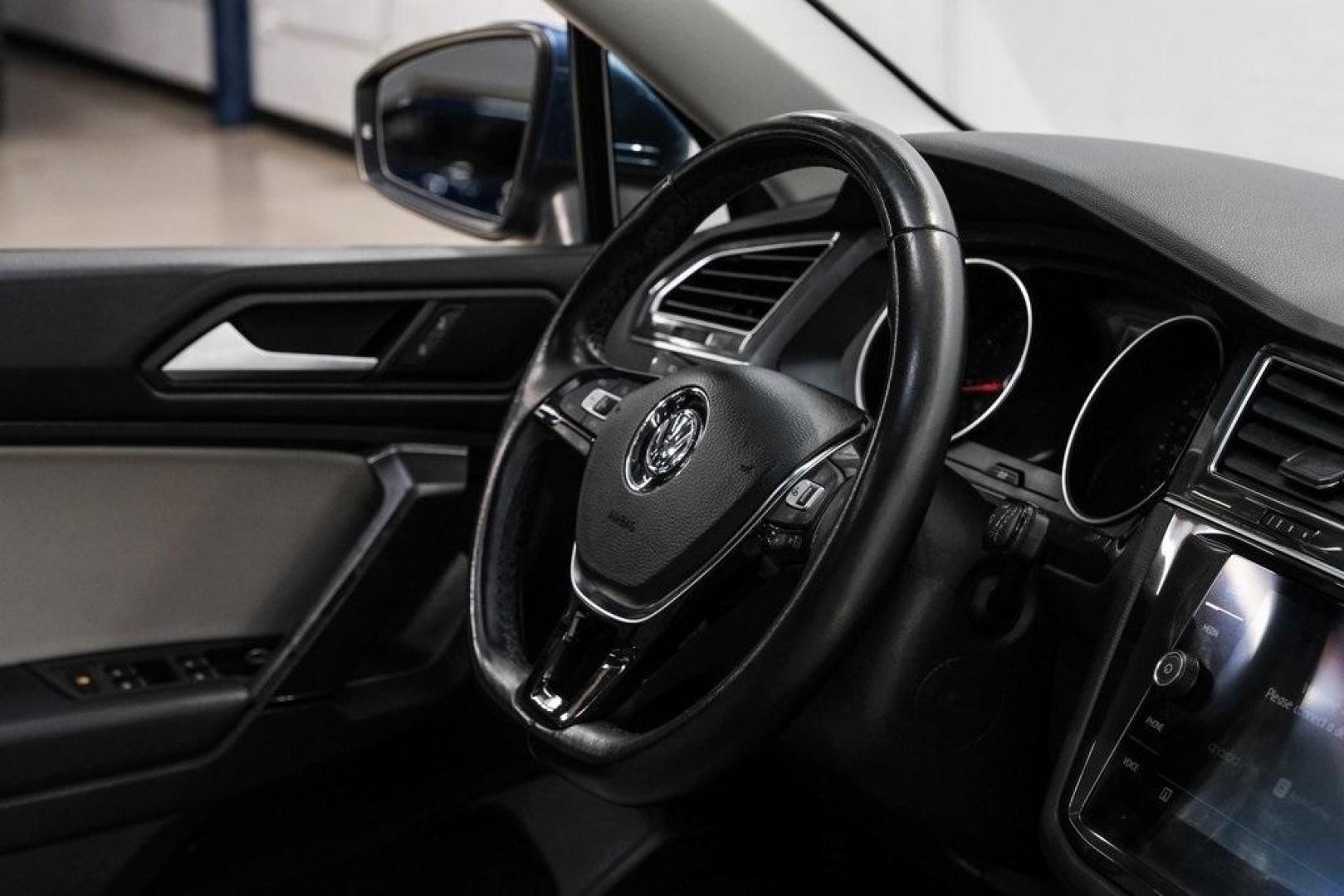 2019 Blue Metallic /Storm Gray Volkswagen Tiguan 2.0T SEL (3VV3B7AX8KM) with an 2.0L TSI DOHC engine, Automatic transmission, located at 15300 Midway Rd., Addison, TX, 75001, (972) 702-0011, 32.958321, -96.838074 - Photo#20