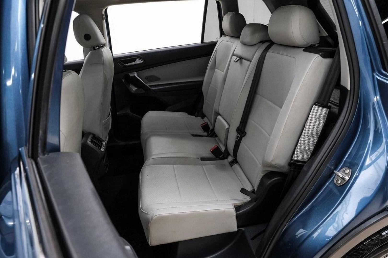 2019 Blue Metallic /Storm Gray Volkswagen Tiguan 2.0T SEL (3VV3B7AX8KM) with an 2.0L TSI DOHC engine, Automatic transmission, located at 15300 Midway Rd., Addison, TX, 75001, (972) 702-0011, 32.958321, -96.838074 - Photo#48