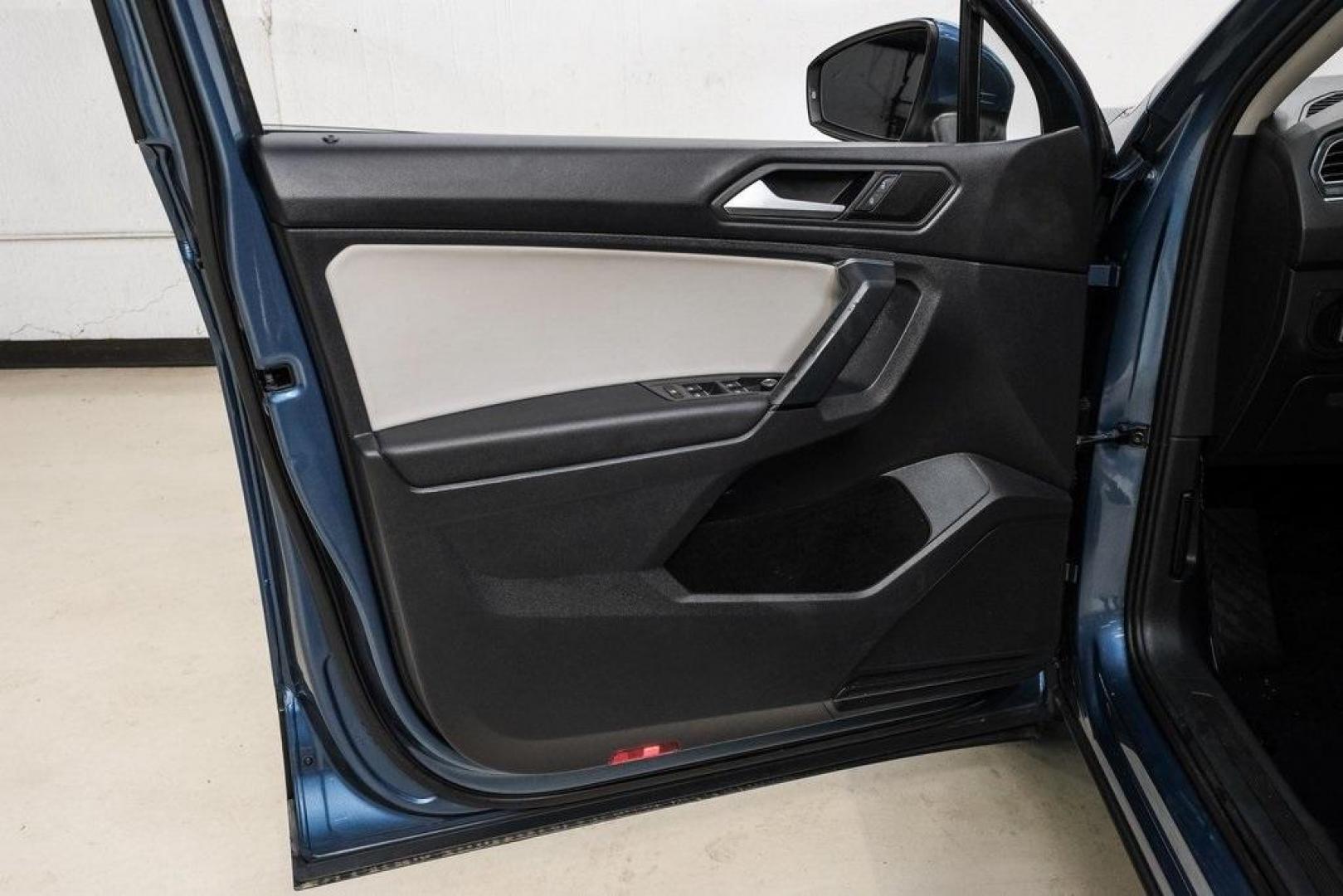 2019 Blue Metallic /Storm Gray Volkswagen Tiguan 2.0T SEL (3VV3B7AX8KM) with an 2.0L TSI DOHC engine, Automatic transmission, located at 15300 Midway Rd., Addison, TX, 75001, (972) 702-0011, 32.958321, -96.838074 - Photo#50