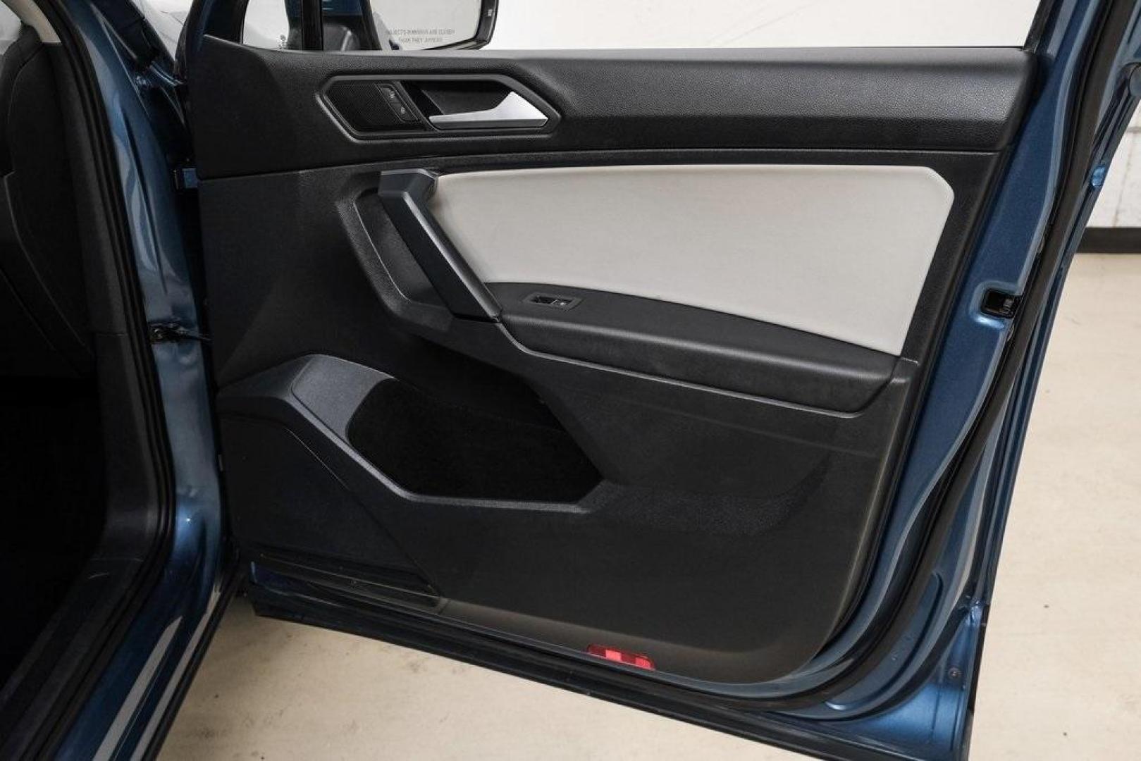 2019 Blue Metallic /Storm Gray Volkswagen Tiguan 2.0T SEL (3VV3B7AX8KM) with an 2.0L TSI DOHC engine, Automatic transmission, located at 15300 Midway Rd., Addison, TX, 75001, (972) 702-0011, 32.958321, -96.838074 - Photo#52