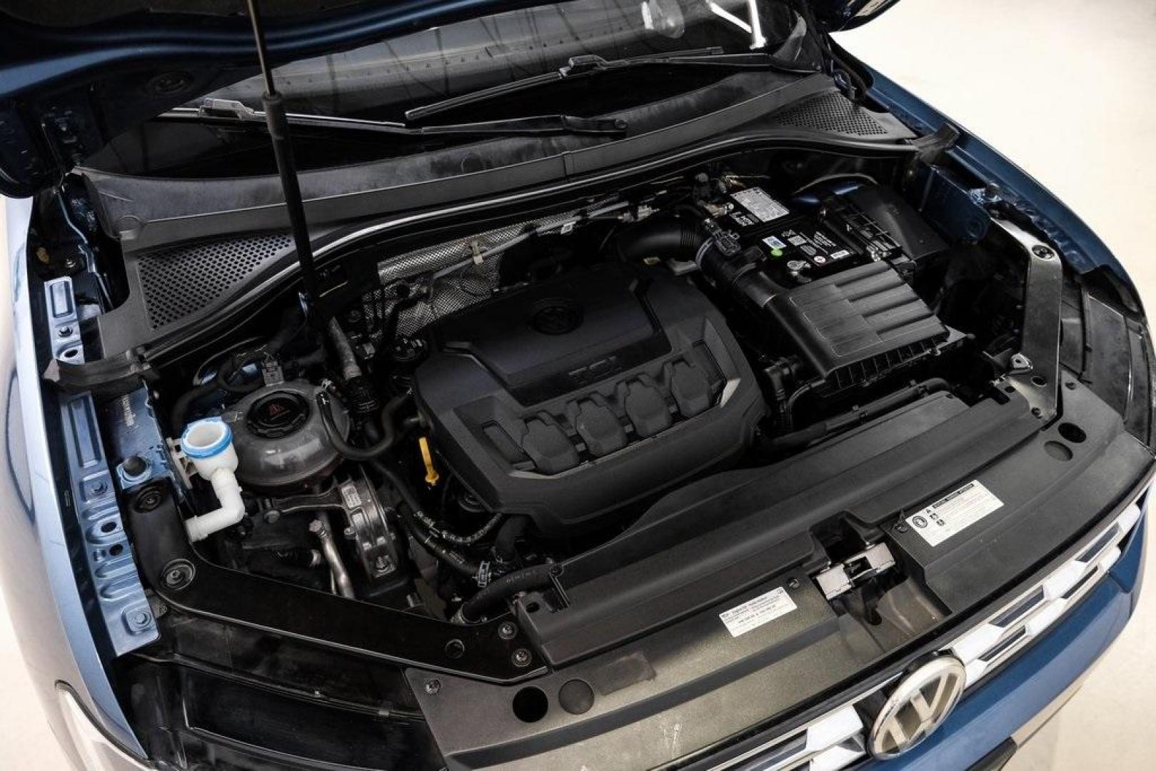 2019 Blue Metallic /Storm Gray Volkswagen Tiguan 2.0T SEL (3VV3B7AX8KM) with an 2.0L TSI DOHC engine, Automatic transmission, located at 15300 Midway Rd., Addison, TX, 75001, (972) 702-0011, 32.958321, -96.838074 - Photo#60