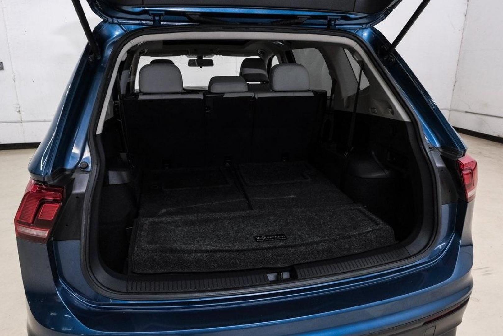 2019 Blue Metallic /Storm Gray Volkswagen Tiguan 2.0T SEL (3VV3B7AX8KM) with an 2.0L TSI DOHC engine, Automatic transmission, located at 15300 Midway Rd., Addison, TX, 75001, (972) 702-0011, 32.958321, -96.838074 - Photo#61