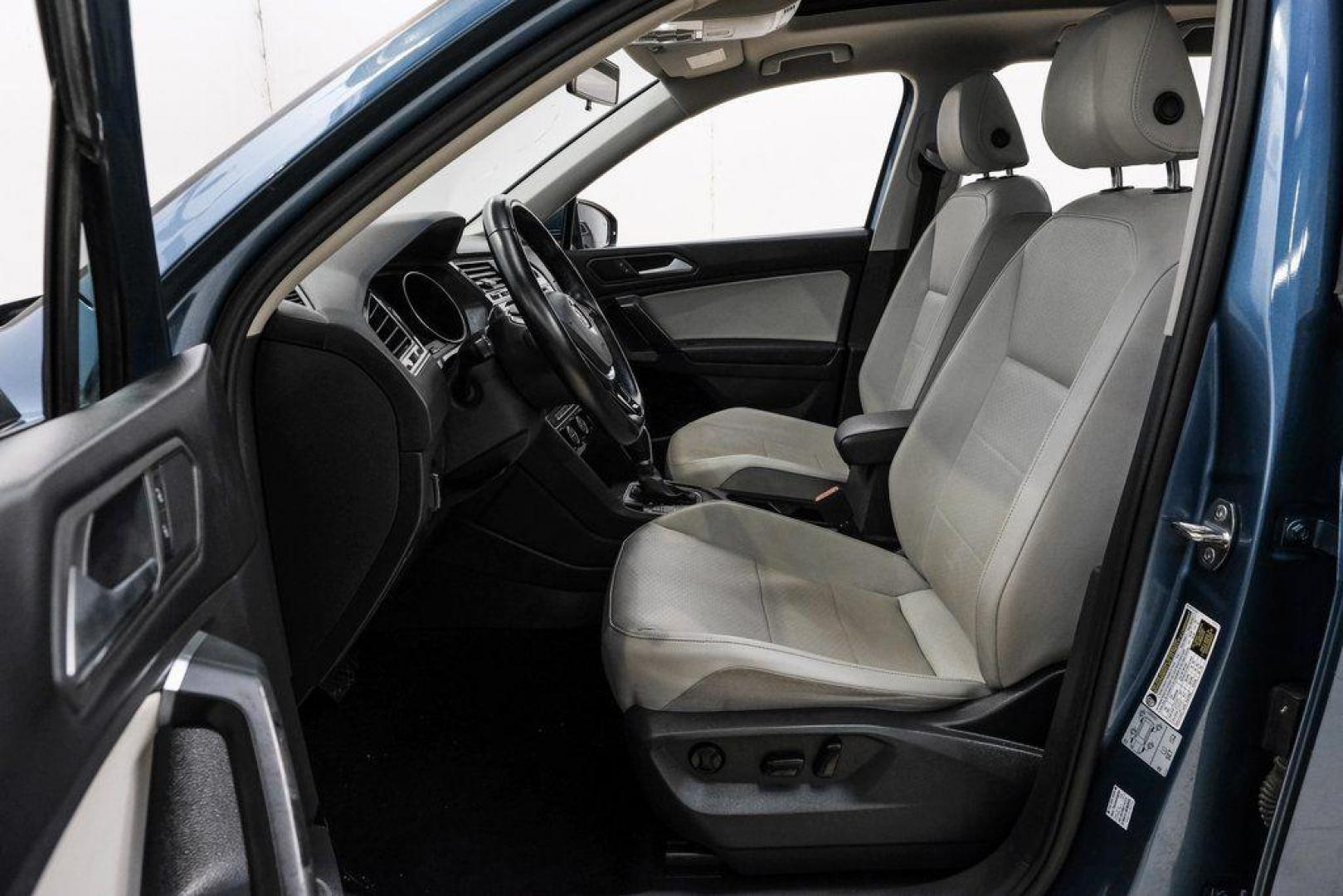 2019 Blue Metallic /Storm Gray Volkswagen Tiguan 2.0T SEL (3VV3B7AX8KM) with an 2.0L TSI DOHC engine, Automatic transmission, located at 15300 Midway Rd., Addison, TX, 75001, (972) 702-0011, 32.958321, -96.838074 - Photo#3