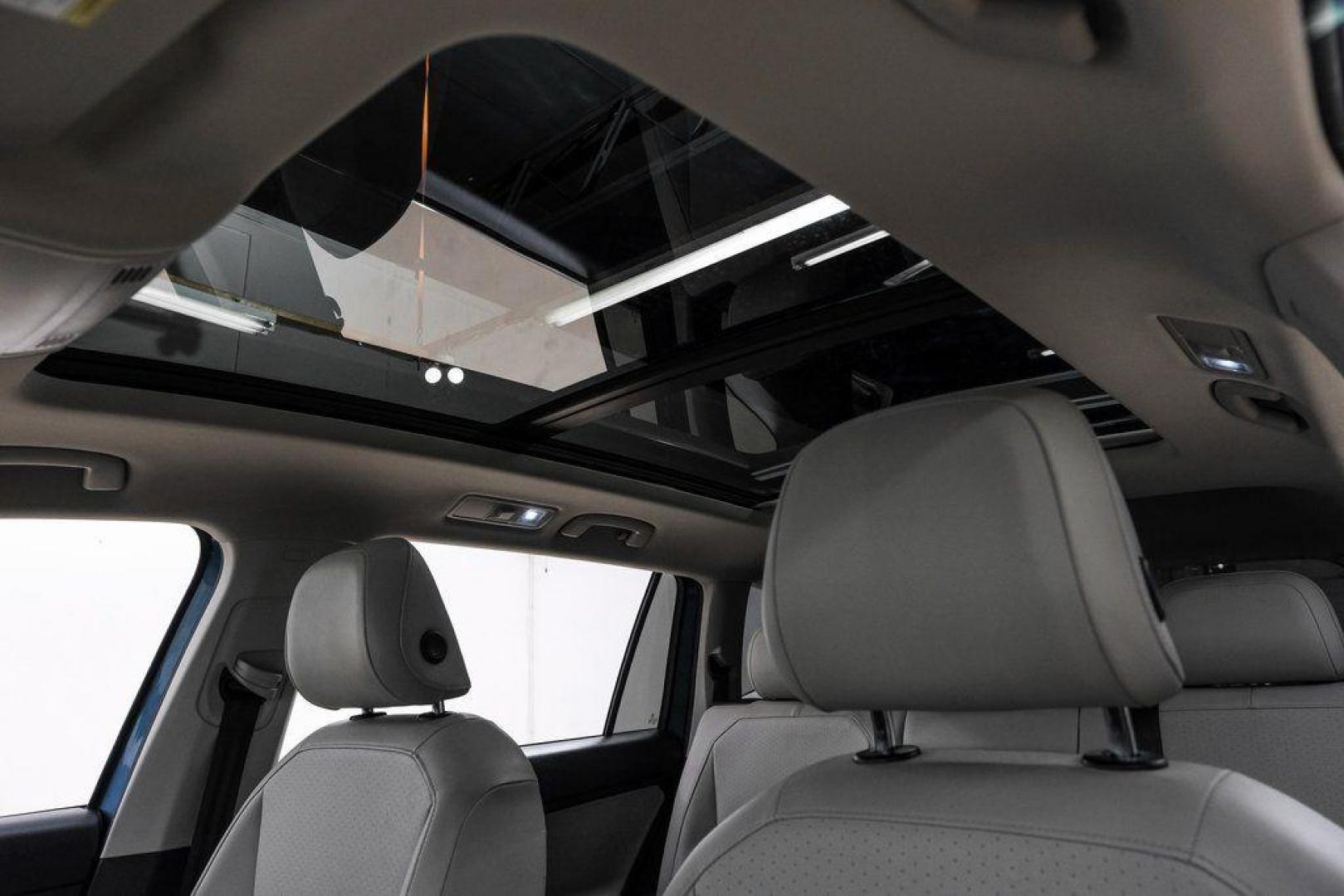 2019 Blue Metallic /Storm Gray Volkswagen Tiguan 2.0T SEL (3VV3B7AX8KM) with an 2.0L TSI DOHC engine, Automatic transmission, located at 15300 Midway Rd., Addison, TX, 75001, (972) 702-0011, 32.958321, -96.838074 - Photo#4