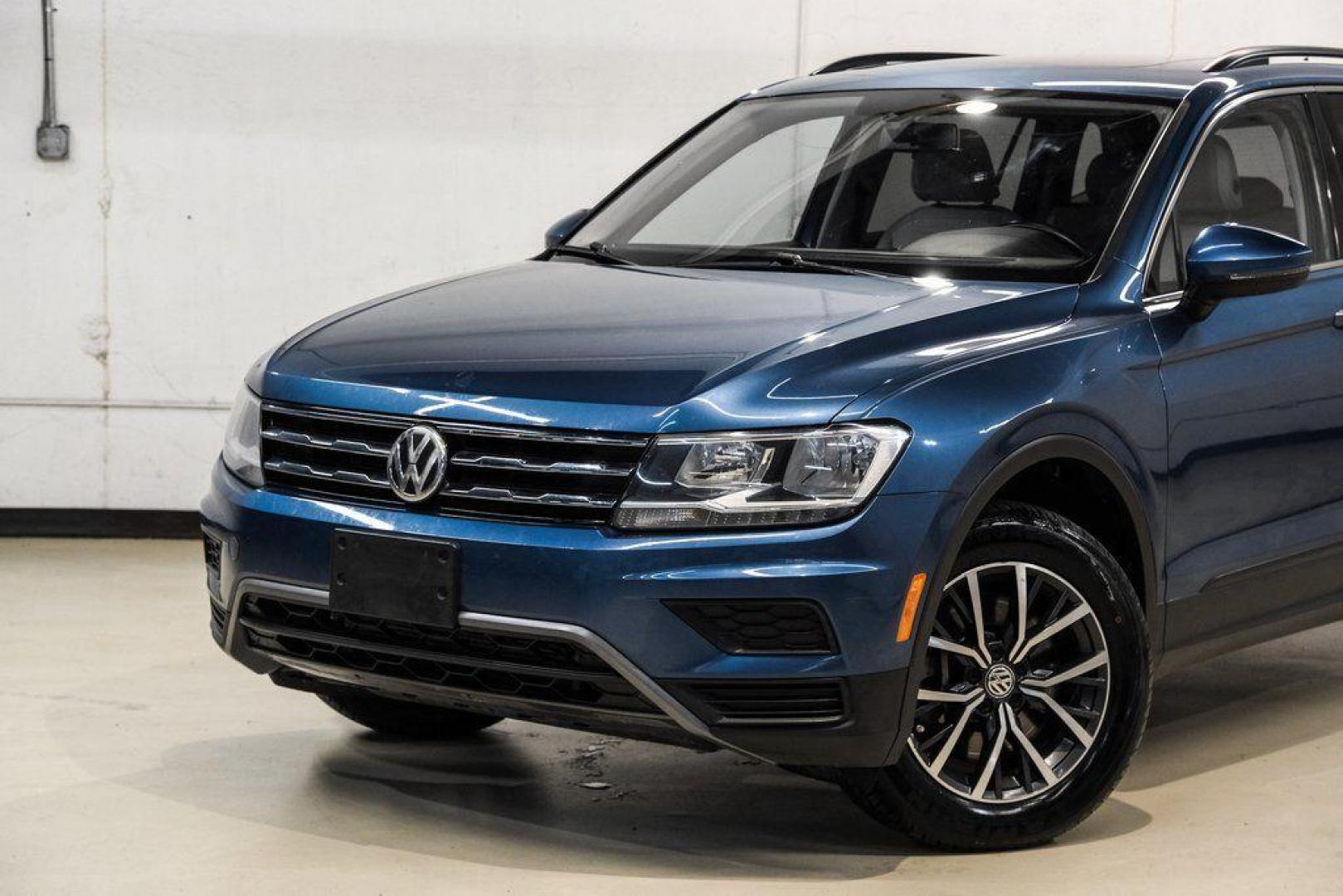 2019 Blue Metallic /Storm Gray Volkswagen Tiguan 2.0T SEL (3VV3B7AX8KM) with an 2.0L TSI DOHC engine, Automatic transmission, located at 15300 Midway Rd., Addison, TX, 75001, (972) 702-0011, 32.958321, -96.838074 - Photo#5