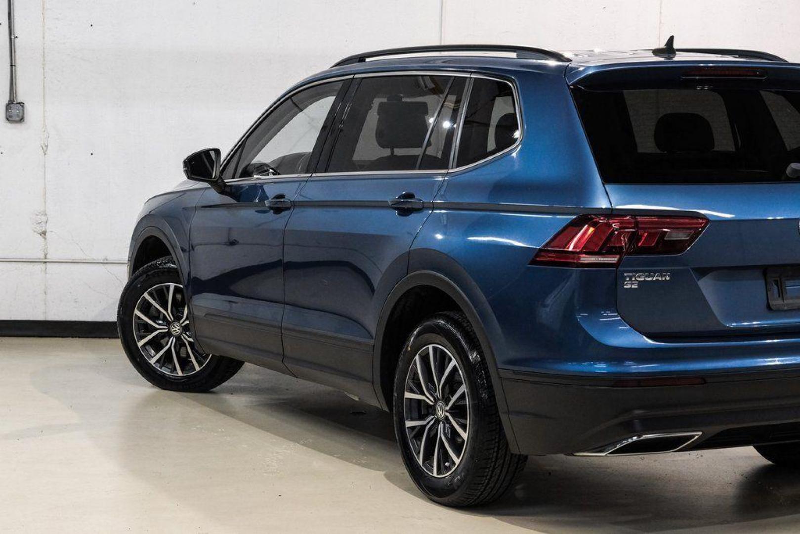 2019 Blue Metallic /Storm Gray Volkswagen Tiguan 2.0T SEL (3VV3B7AX8KM) with an 2.0L TSI DOHC engine, Automatic transmission, located at 15300 Midway Rd., Addison, TX, 75001, (972) 702-0011, 32.958321, -96.838074 - Photo#13