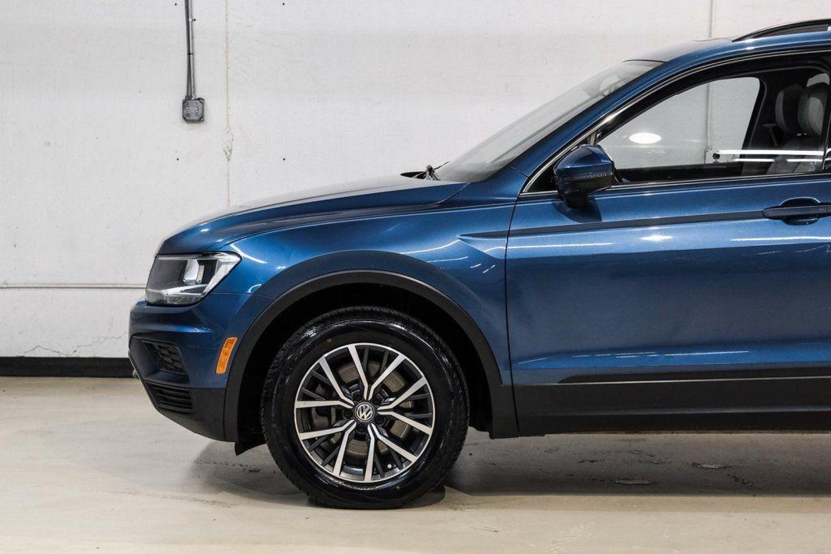 2019 Blue Metallic /Storm Gray Volkswagen Tiguan 2.0T SEL (3VV3B7AX8KM) with an 2.0L TSI DOHC engine, Automatic transmission, located at 15300 Midway Rd., Addison, TX, 75001, (972) 702-0011, 32.958321, -96.838074 - Photo#16