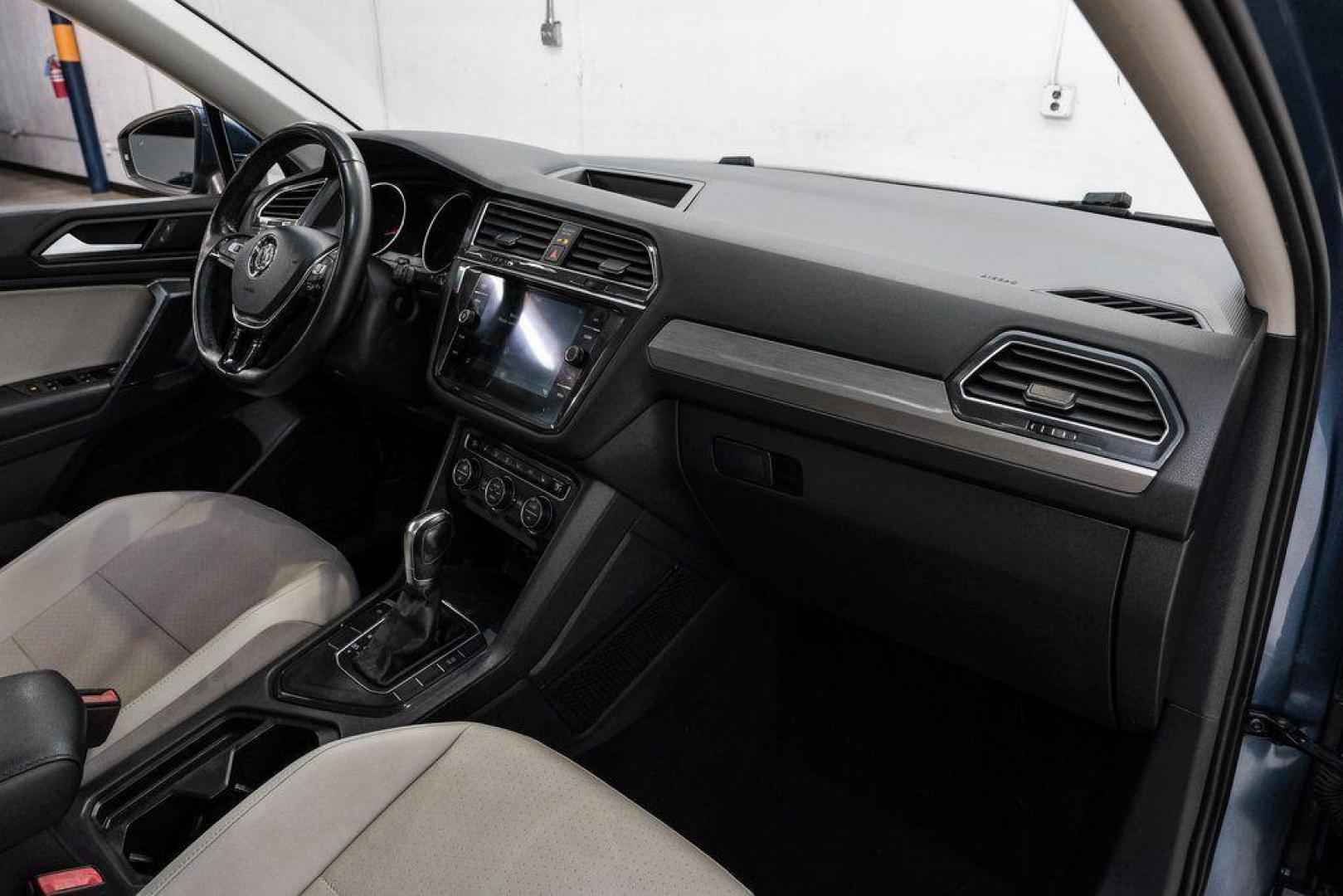 2019 Blue Metallic /Storm Gray Volkswagen Tiguan 2.0T SEL (3VV3B7AX8KM) with an 2.0L TSI DOHC engine, Automatic transmission, located at 15300 Midway Rd., Addison, TX, 75001, (972) 702-0011, 32.958321, -96.838074 - Photo#18