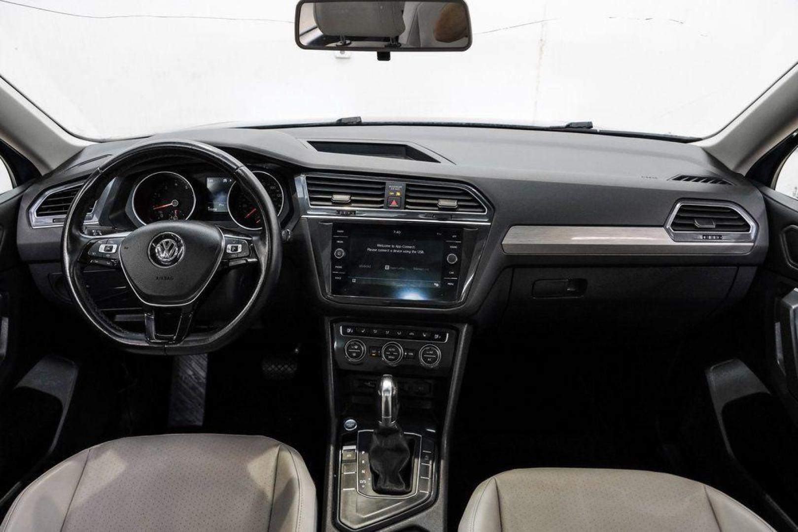 2019 Blue Metallic /Storm Gray Volkswagen Tiguan 2.0T SEL (3VV3B7AX8KM) with an 2.0L TSI DOHC engine, Automatic transmission, located at 15300 Midway Rd., Addison, TX, 75001, (972) 702-0011, 32.958321, -96.838074 - Photo#19