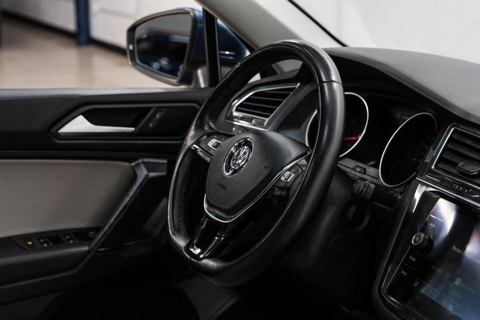 2019 Blue Metallic /Storm Gray Volkswagen Tiguan 2.0T SEL (3VV3B7AX8KM) with an 2.0L TSI DOHC engine, Automatic transmission, located at 15300 Midway Rd., Addison, TX, 75001, (972) 702-0011, 32.958321, -96.838074 - Photo#20