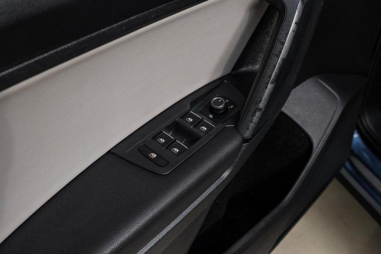 2019 Blue Metallic /Storm Gray Volkswagen Tiguan 2.0T SEL (3VV3B7AX8KM) with an 2.0L TSI DOHC engine, Automatic transmission, located at 15300 Midway Rd., Addison, TX, 75001, (972) 702-0011, 32.958321, -96.838074 - Photo#51