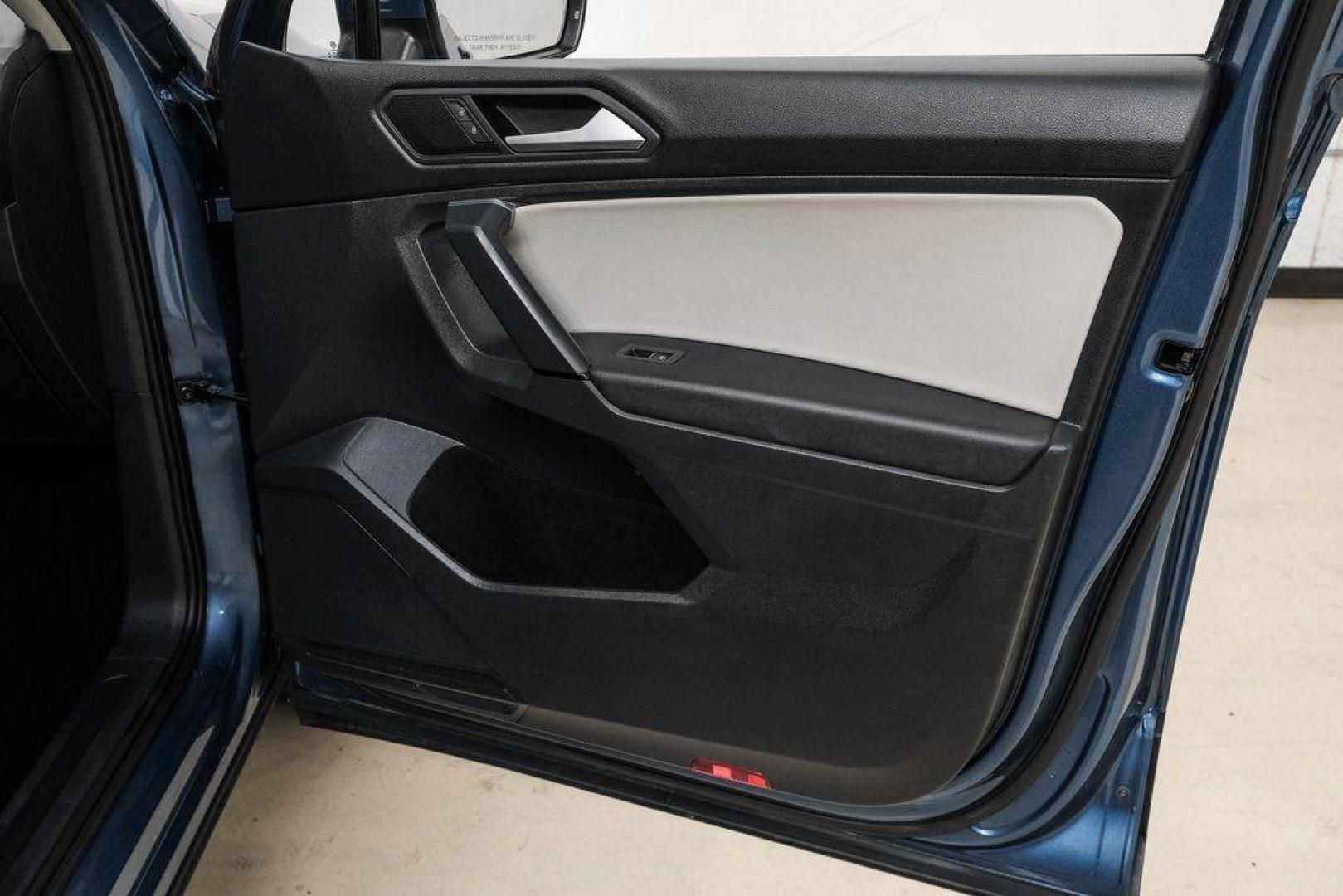 2019 Blue Metallic /Storm Gray Volkswagen Tiguan 2.0T SEL (3VV3B7AX8KM) with an 2.0L TSI DOHC engine, Automatic transmission, located at 15300 Midway Rd., Addison, TX, 75001, (972) 702-0011, 32.958321, -96.838074 - Photo#52