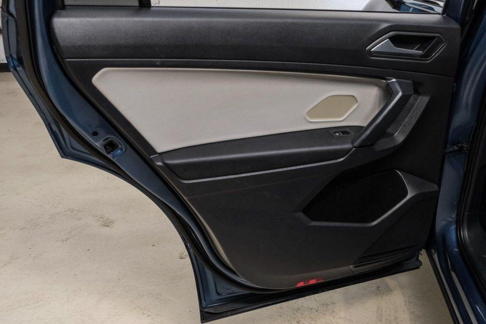 2019 Blue Metallic /Storm Gray Volkswagen Tiguan 2.0T SEL (3VV3B7AX8KM) with an 2.0L TSI DOHC engine, Automatic transmission, located at 15300 Midway Rd., Addison, TX, 75001, (972) 702-0011, 32.958321, -96.838074 - Photo#53