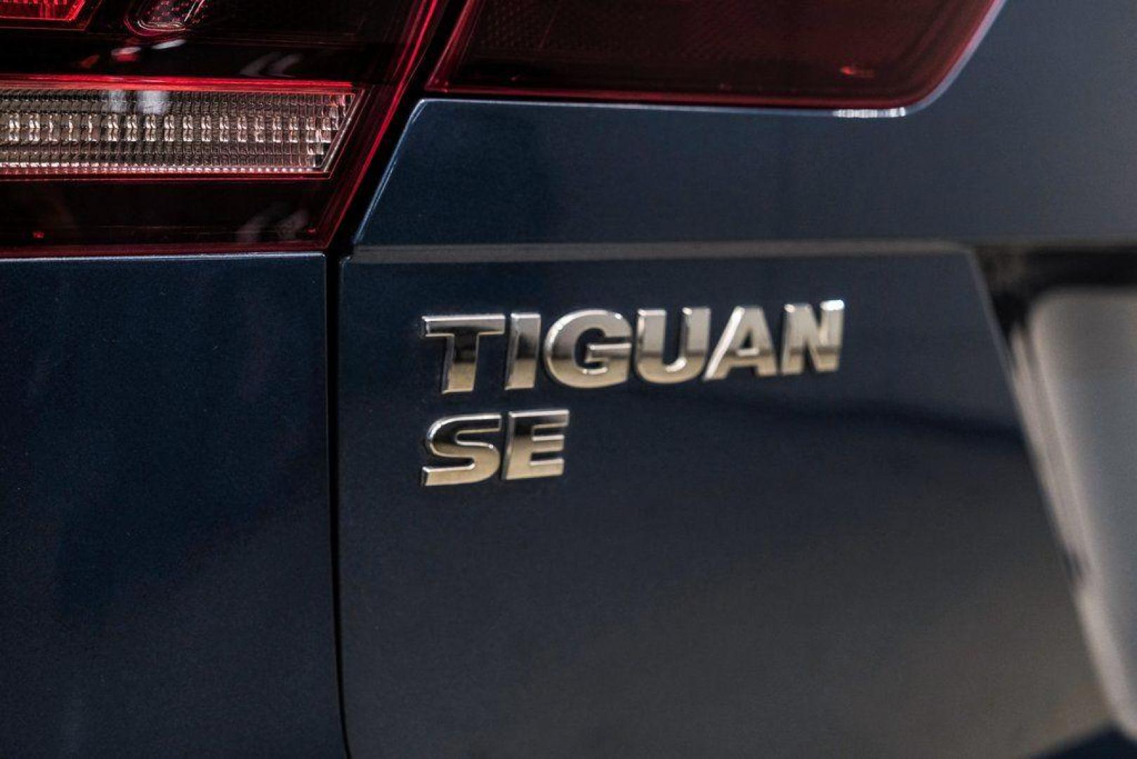 2019 Blue Metallic /Storm Gray Volkswagen Tiguan 2.0T SEL (3VV3B7AX8KM) with an 2.0L TSI DOHC engine, Automatic transmission, located at 15300 Midway Rd., Addison, TX, 75001, (972) 702-0011, 32.958321, -96.838074 - Photo#57